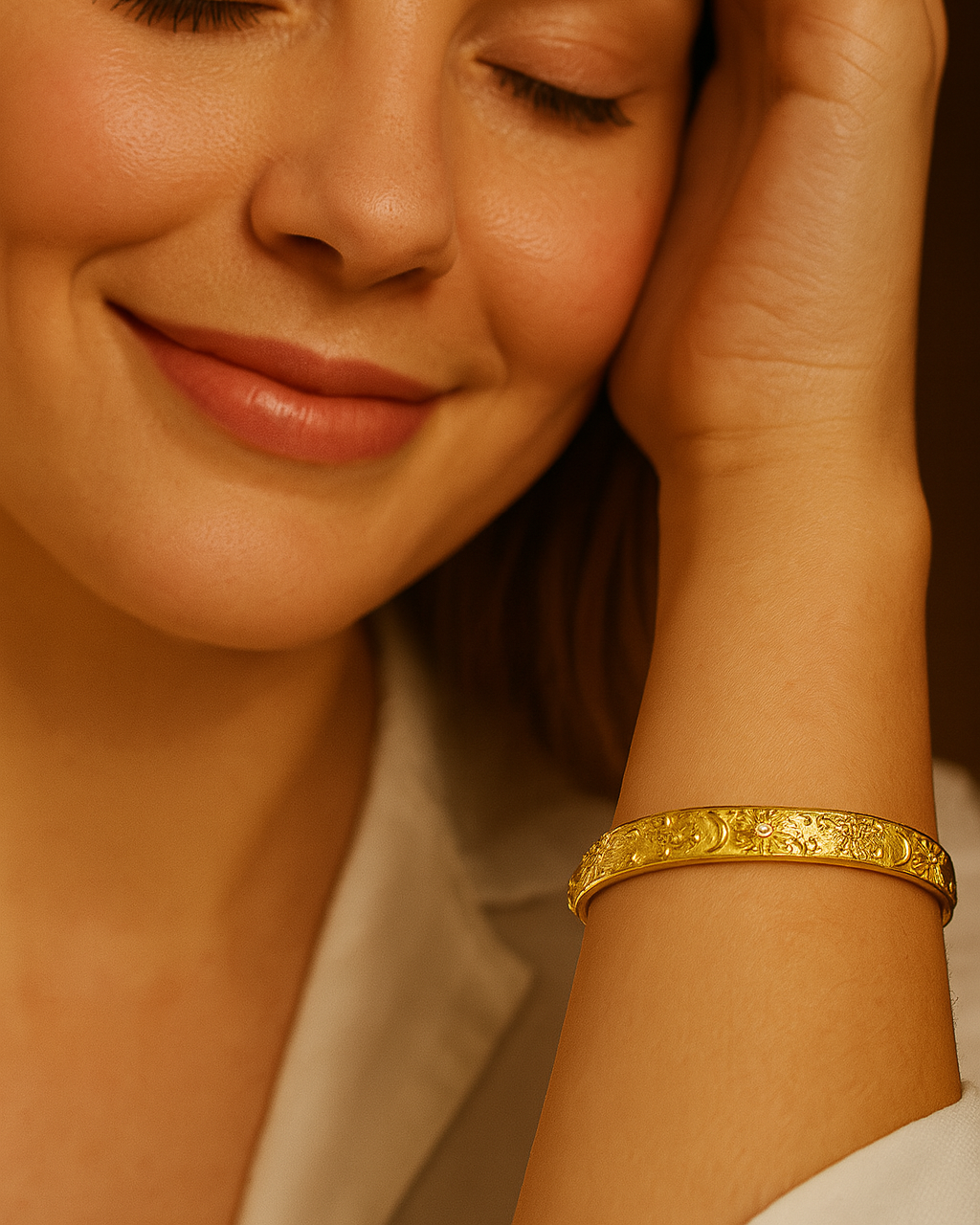 Manjaras Nina gold-plated cuff bracelet on wrist