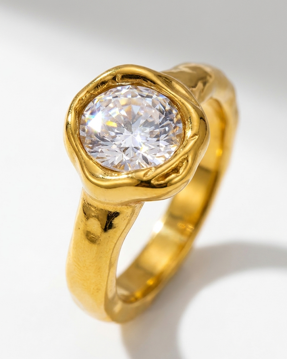 Suri Ring close-up oval cubic zirconia gold bezel