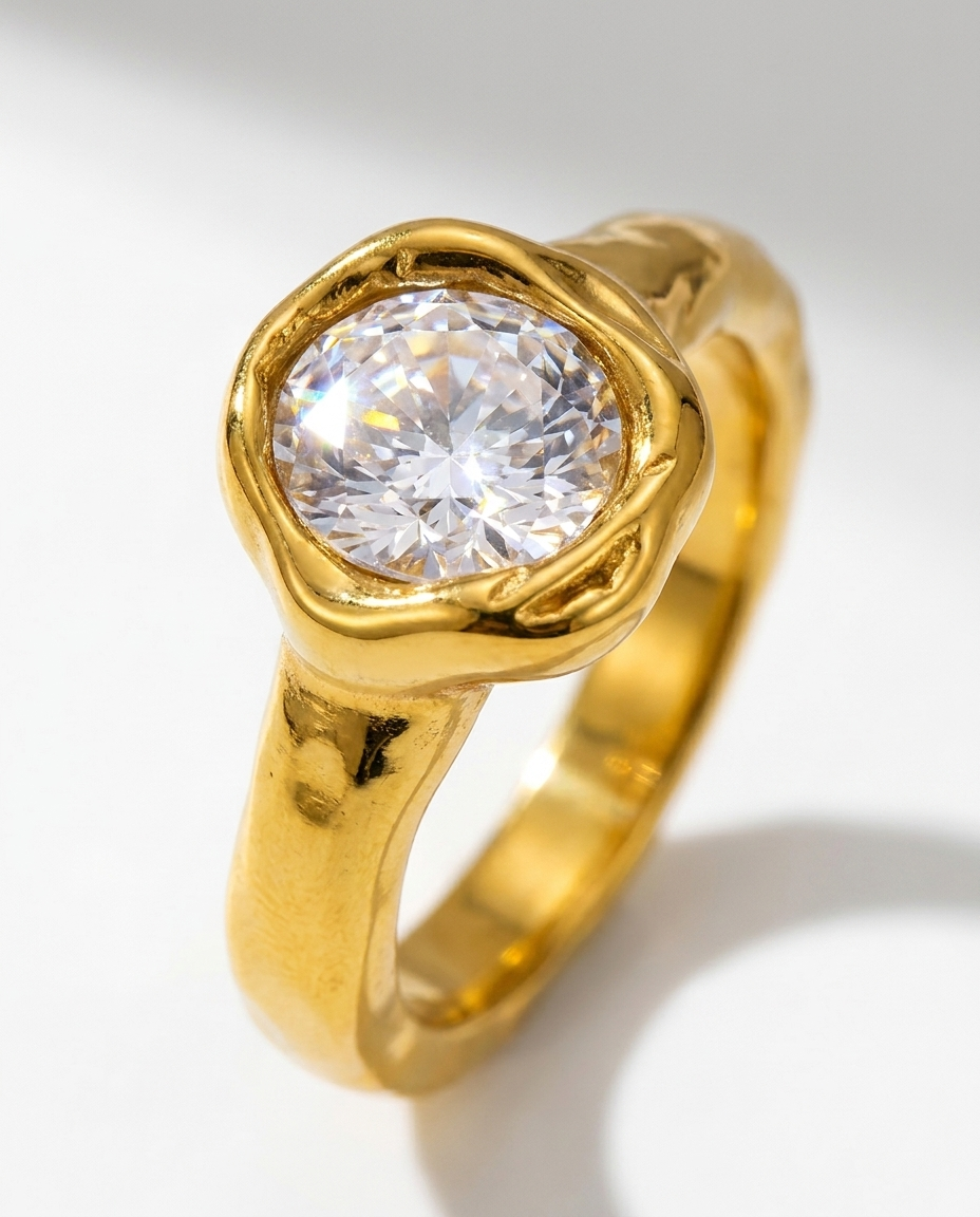 Suri Ring close-up oval cubic zirconia gold bezel