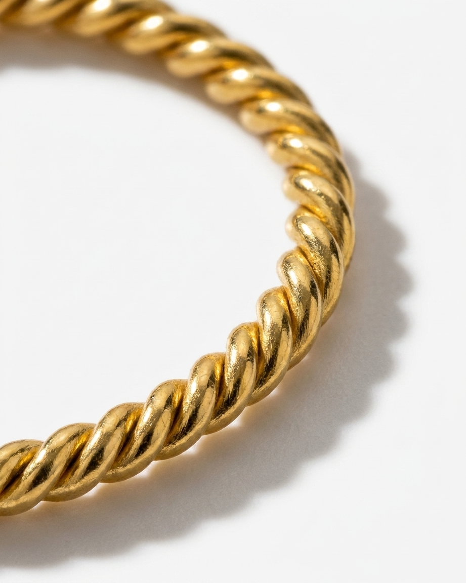 Sabine Ring close-up gold band texture