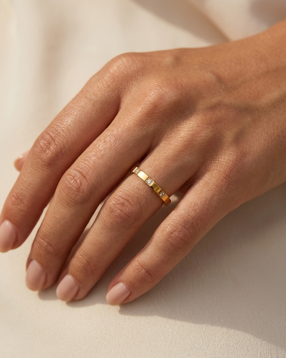 Calla Stacking Ring worn on hand gold stacking band