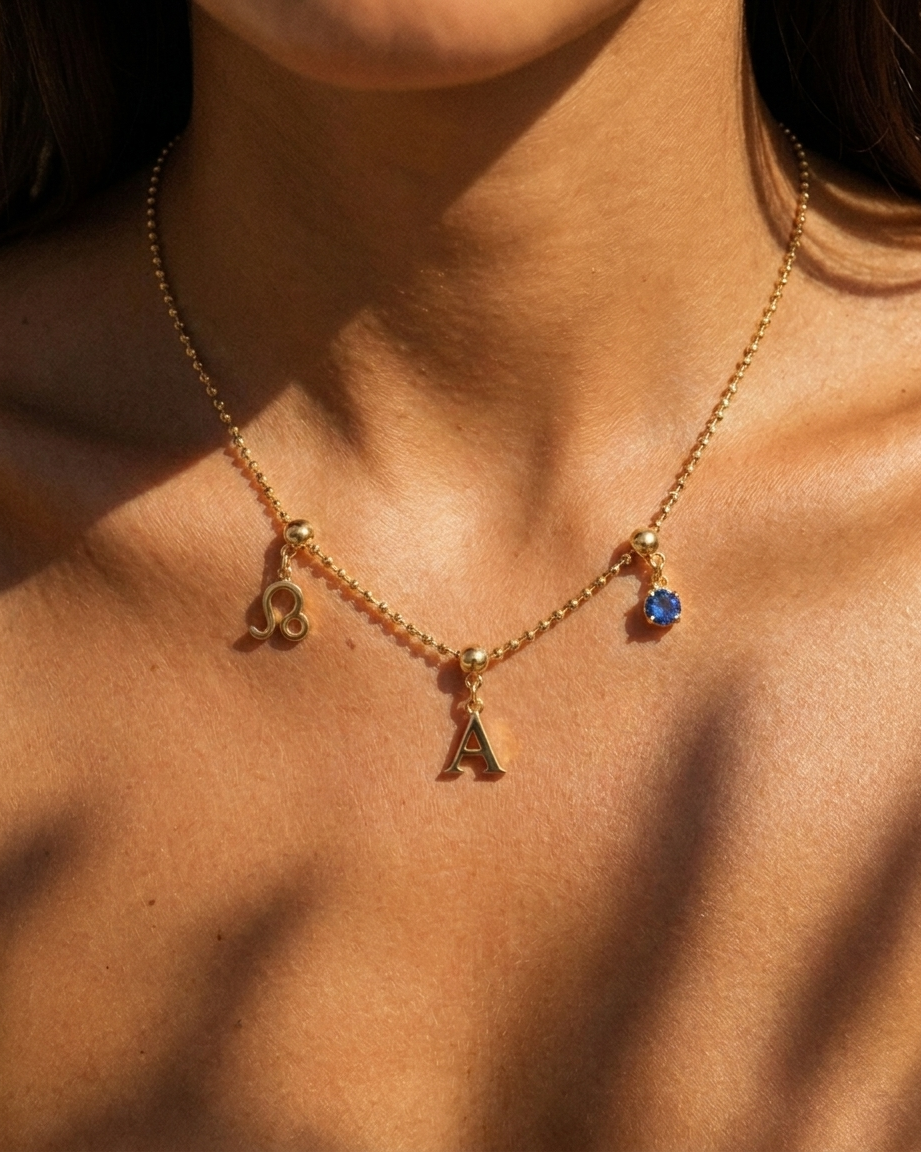 Liv Beaded Necklace styled with gold charm cluster on model