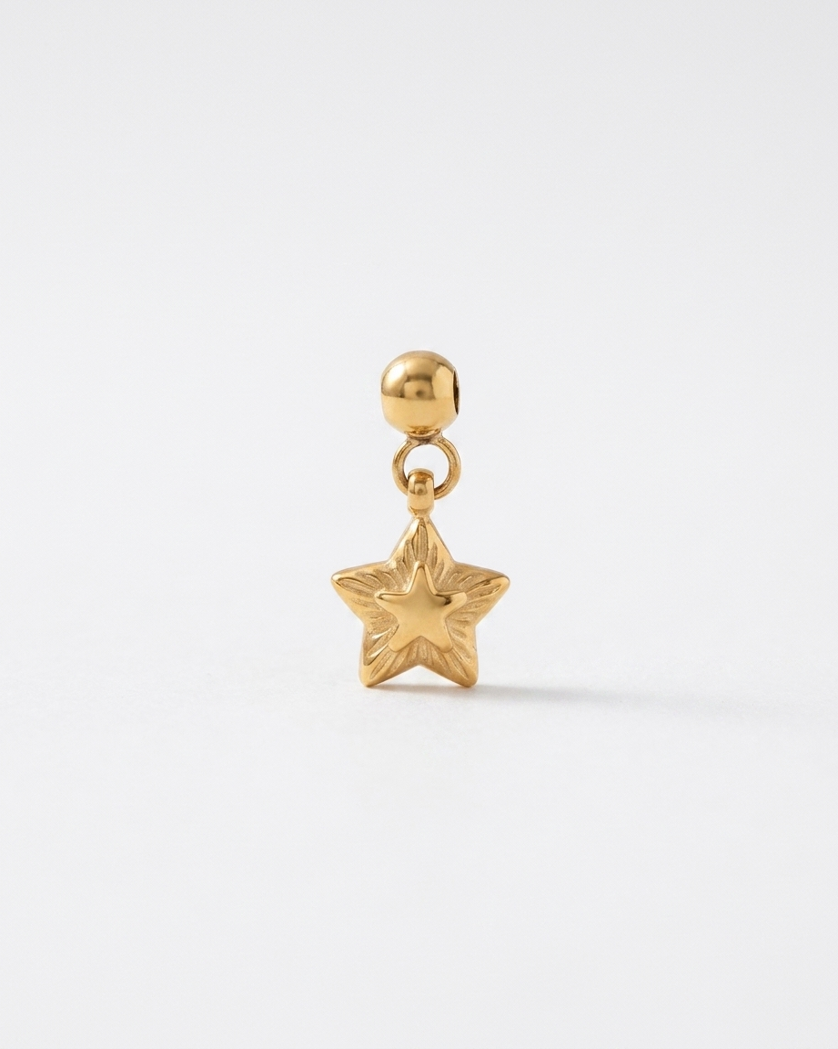 Layered star gold charm pendant hero