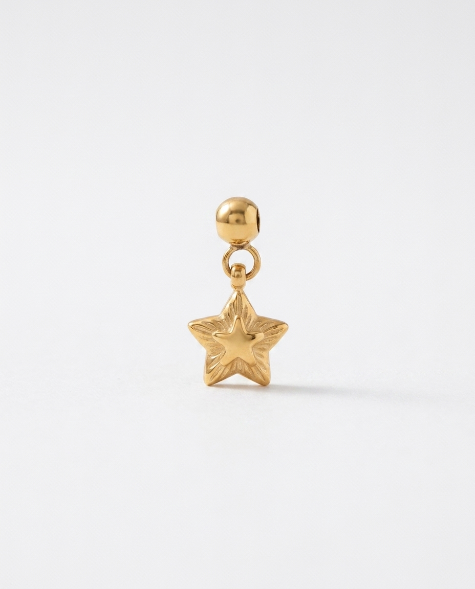Layered star gold charm pendant hero