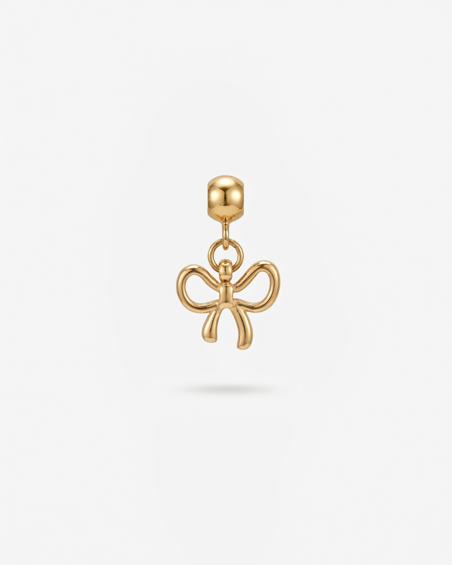 Bow gold charm pendant hero