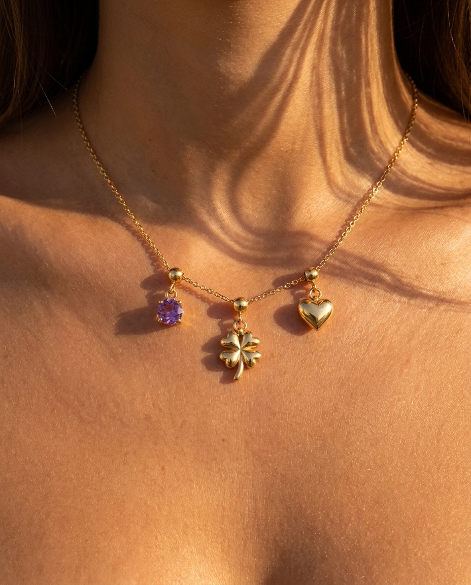 Quatrefoil flower charm styled with February amethyst and heart on chain