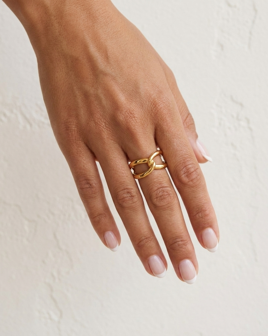 Isadora Twist Ring cream wall hand