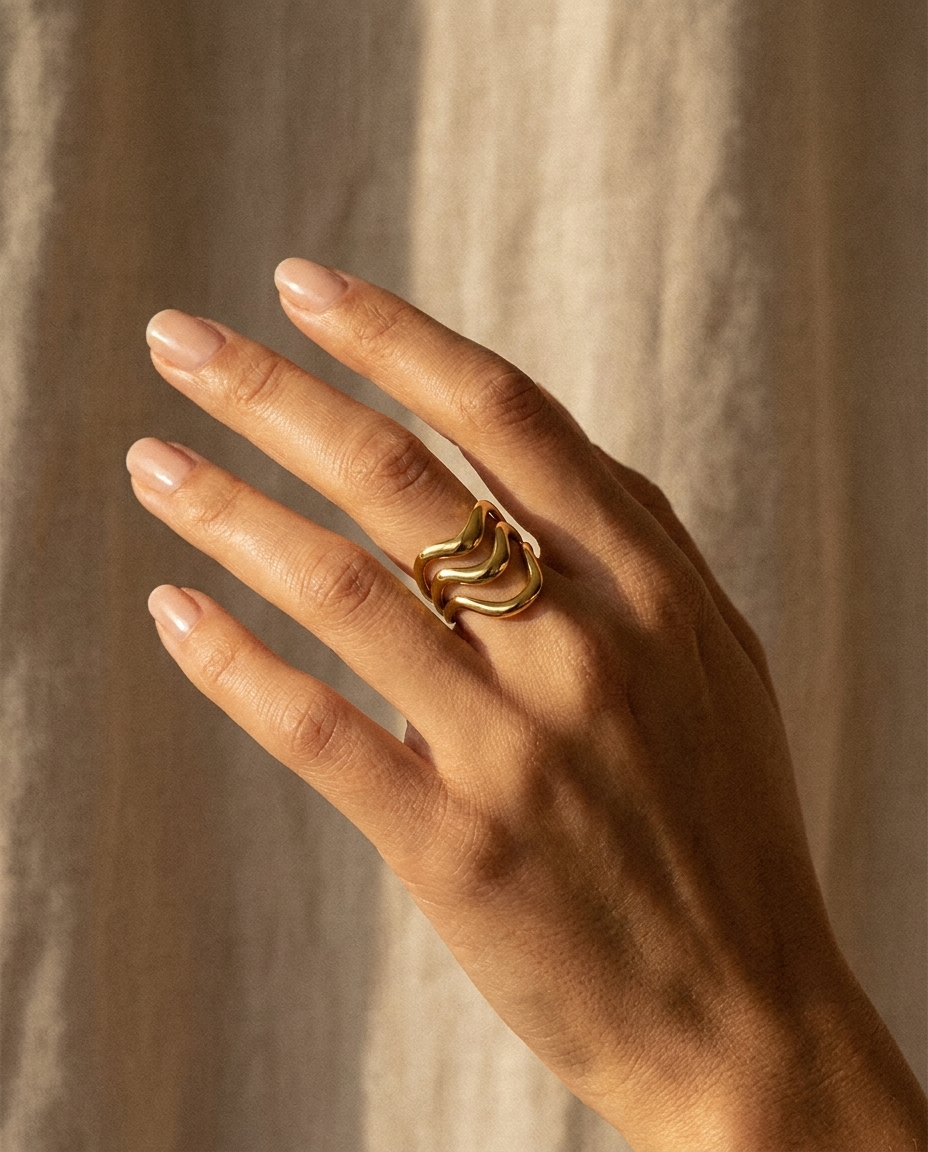 Gold Wave Statement Ring on hand