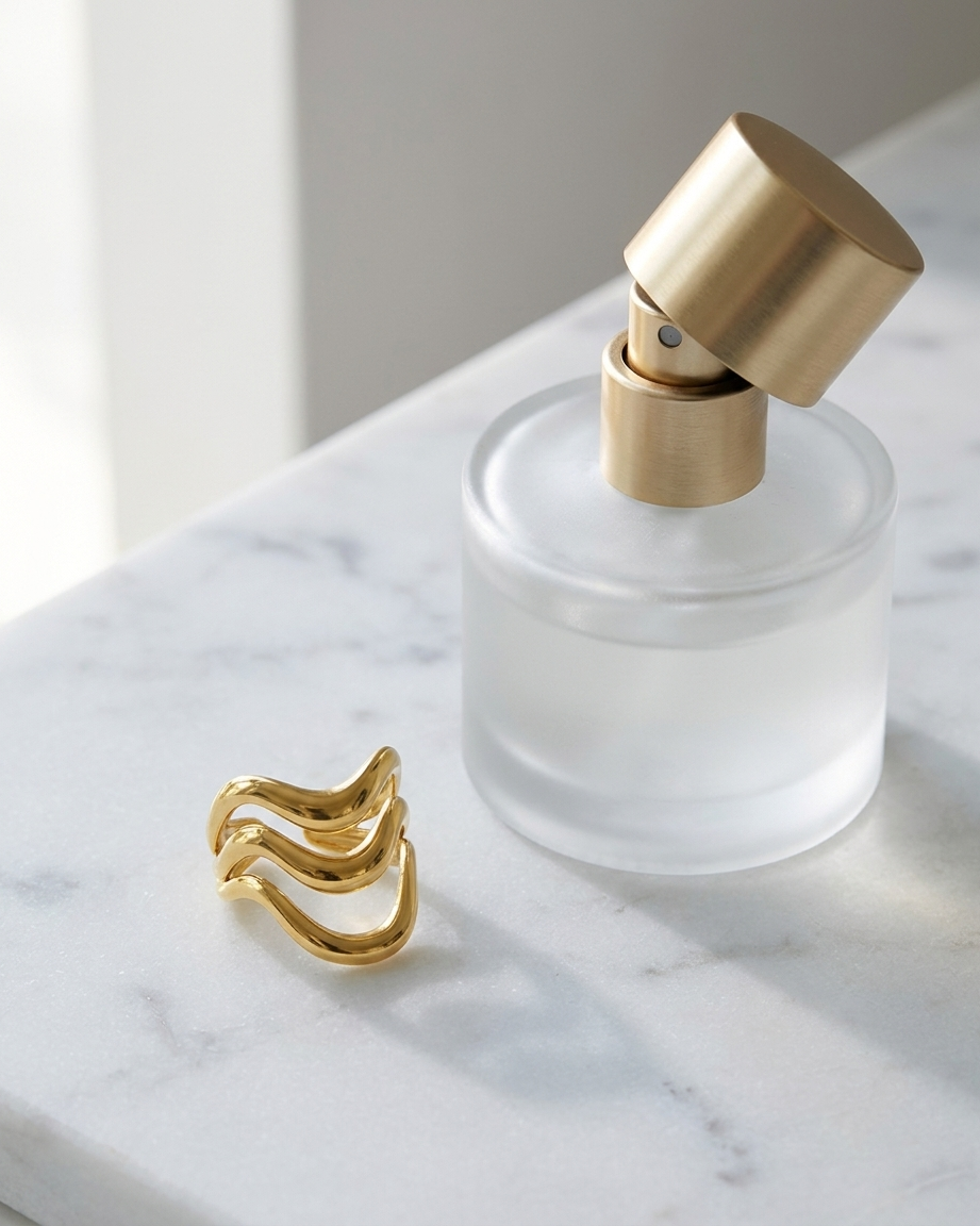 Gold Wave Statement Ring marble flatlay