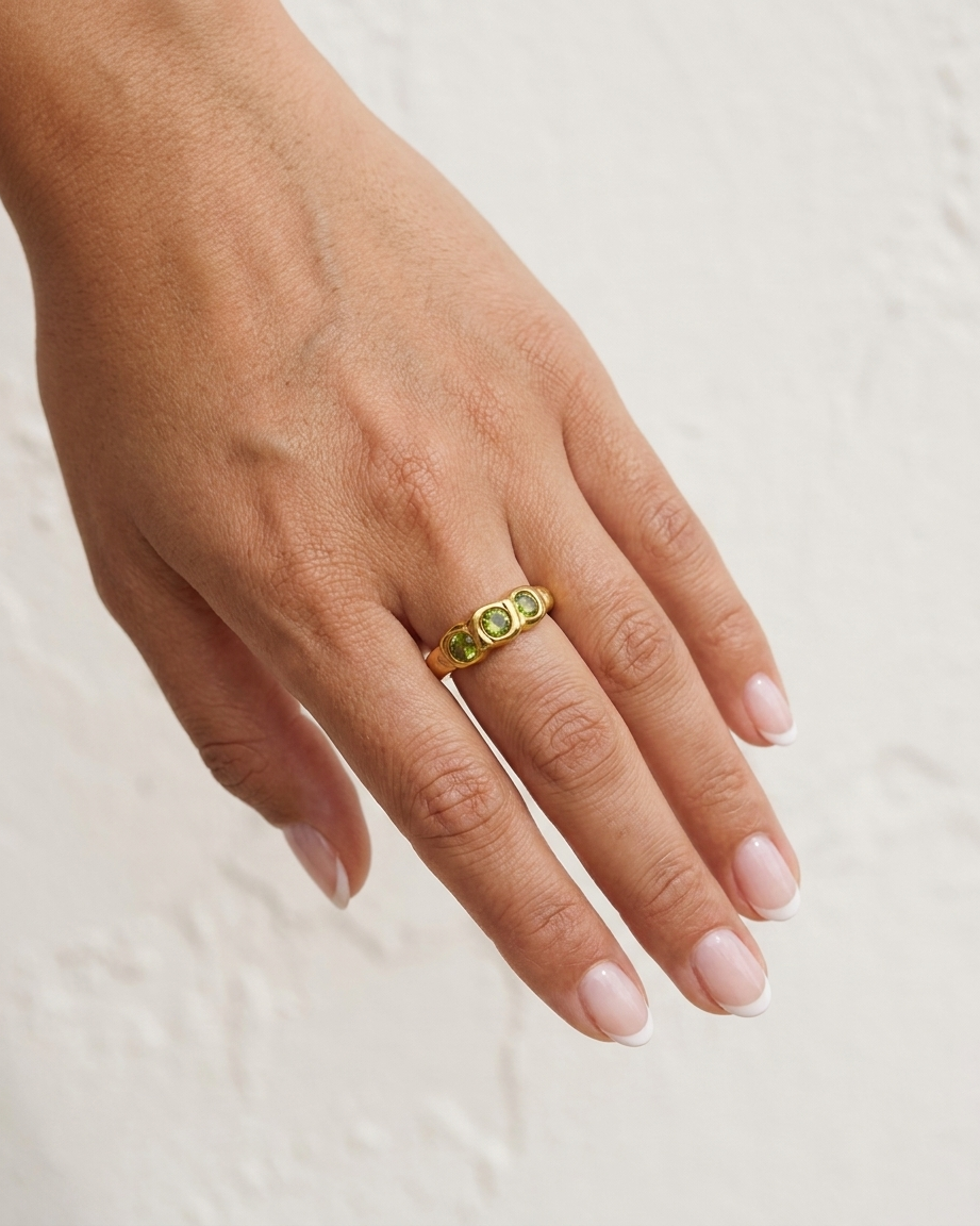 Gaia Textured Gold Ring cream wall hand