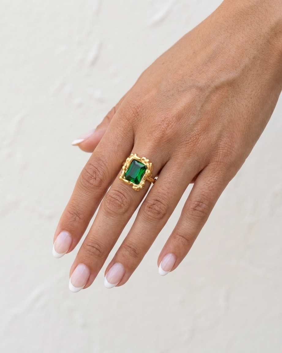 Colette Emerald Ring cream wall hand