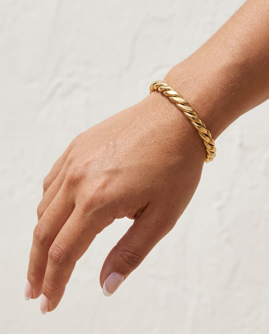 Celia Bracelet cuff on wrist cream wall