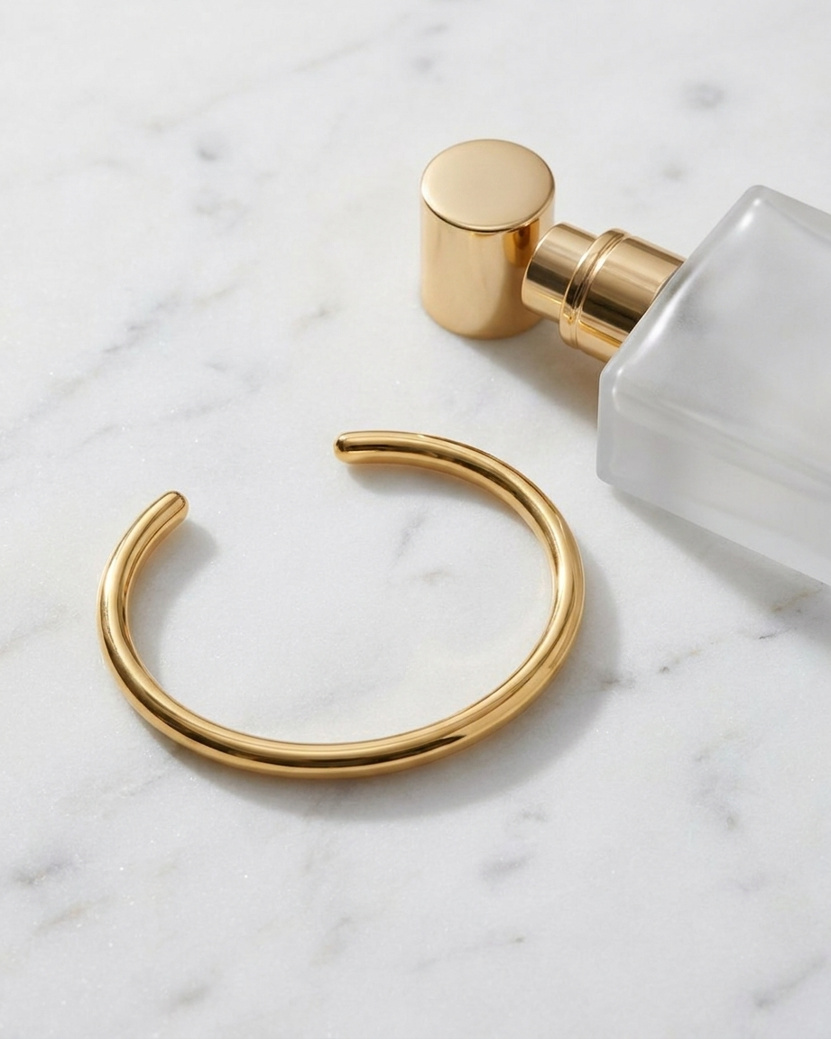 Solene Gold Bangle marble flatlay