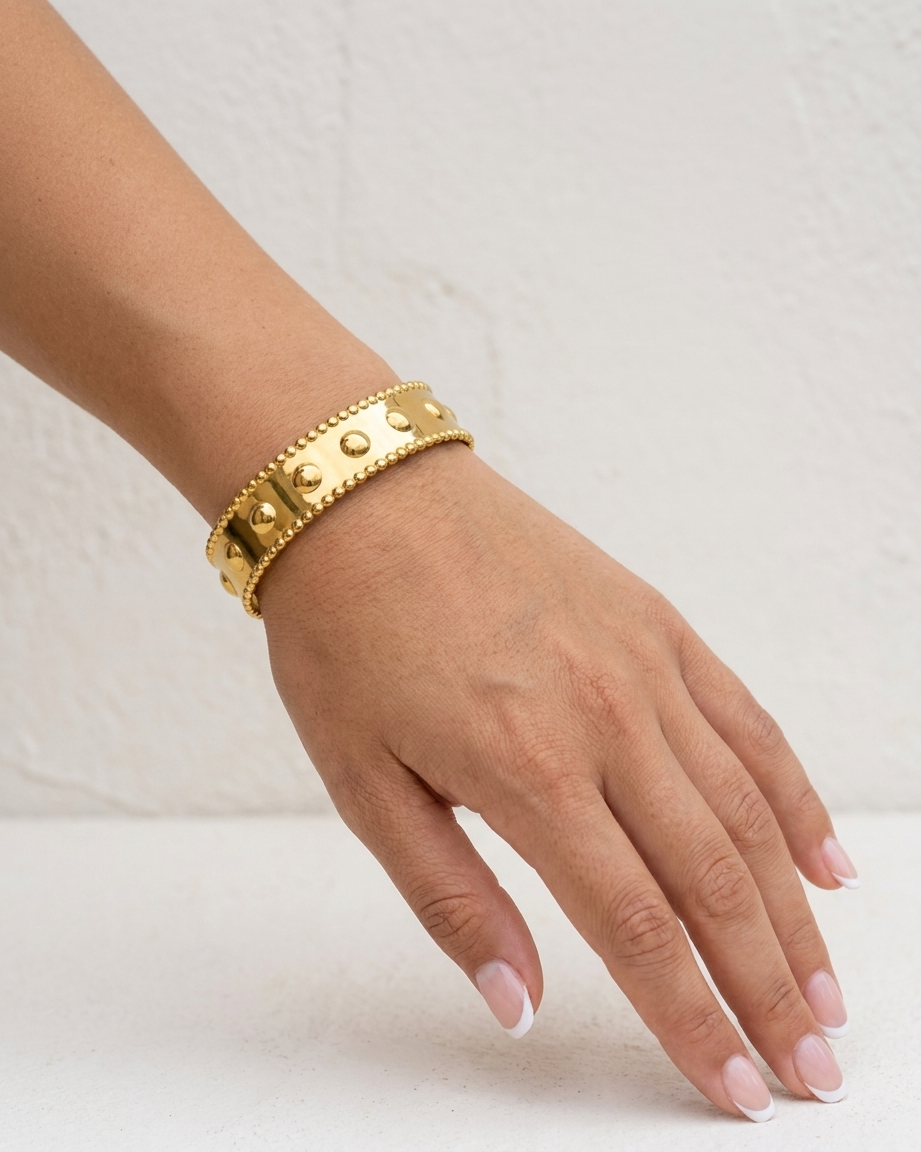 Luna Textured Cuff on wrist plaster wall