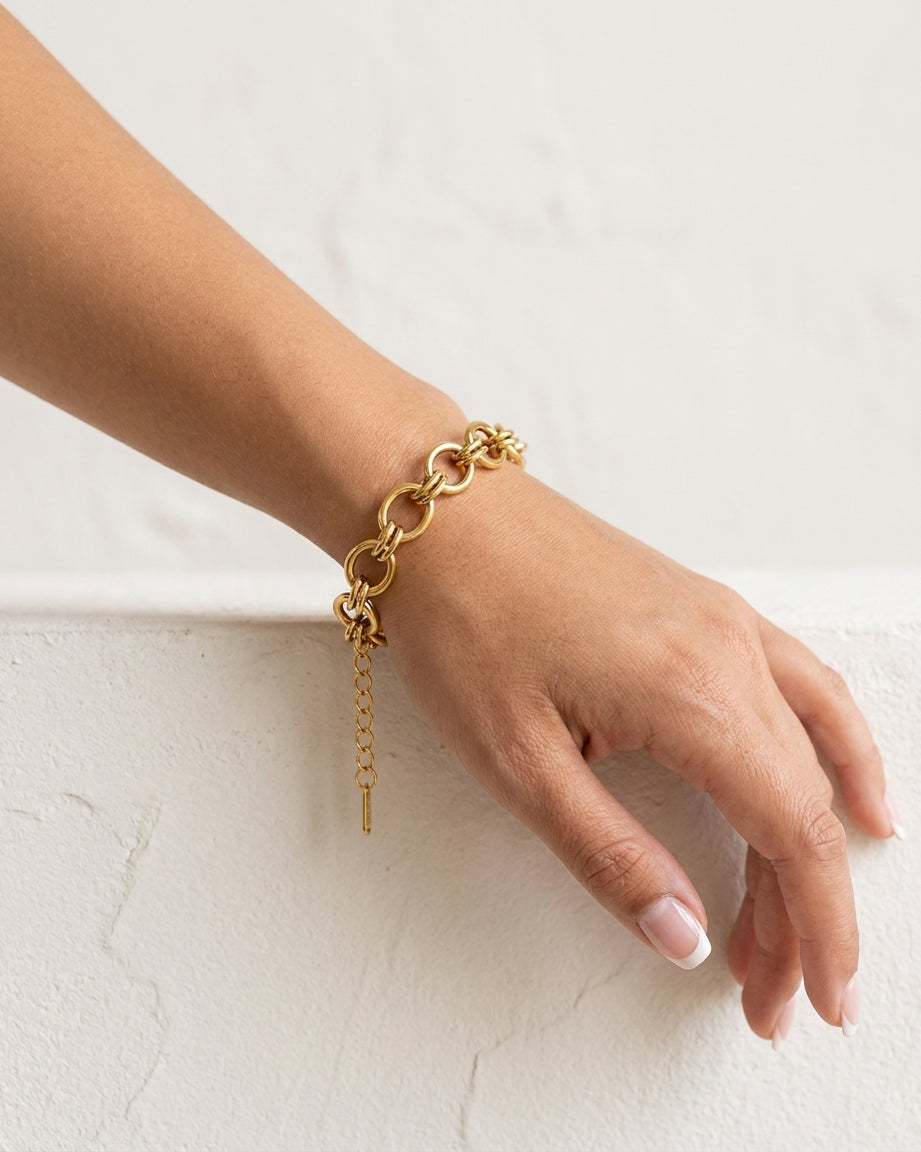 Anais Link Bracelet on wrist plaster wall