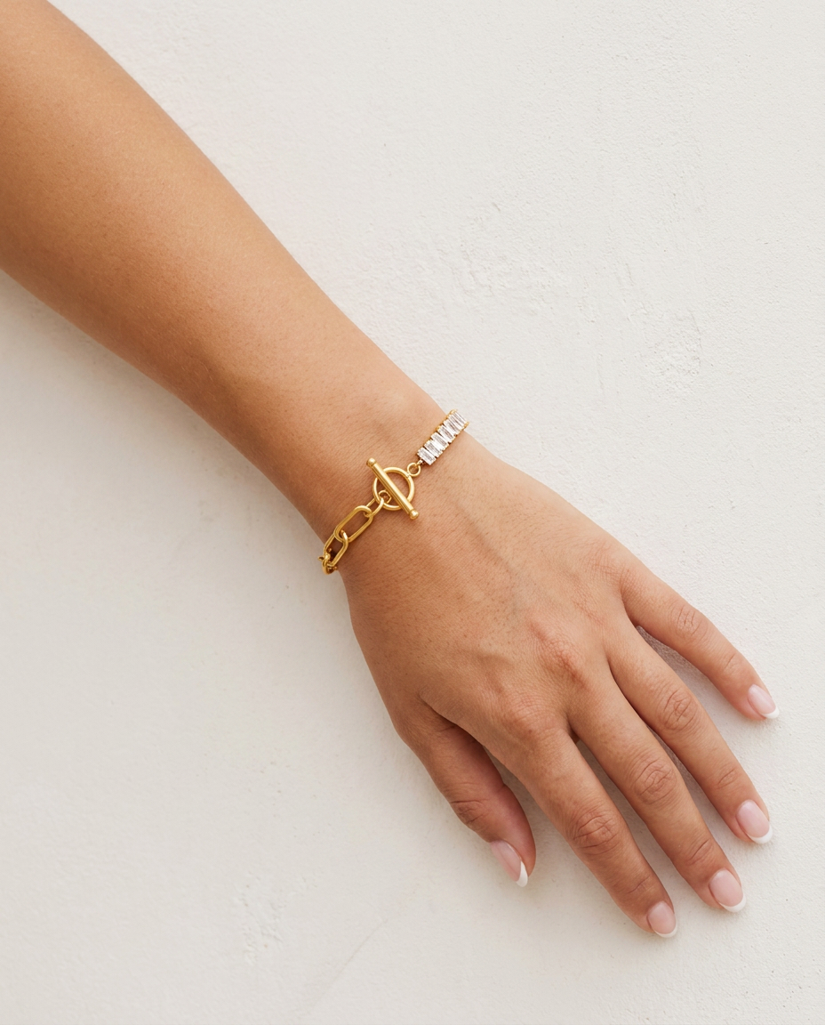Blanche Chunky Paperclip Bracelet on wrist plaster wall