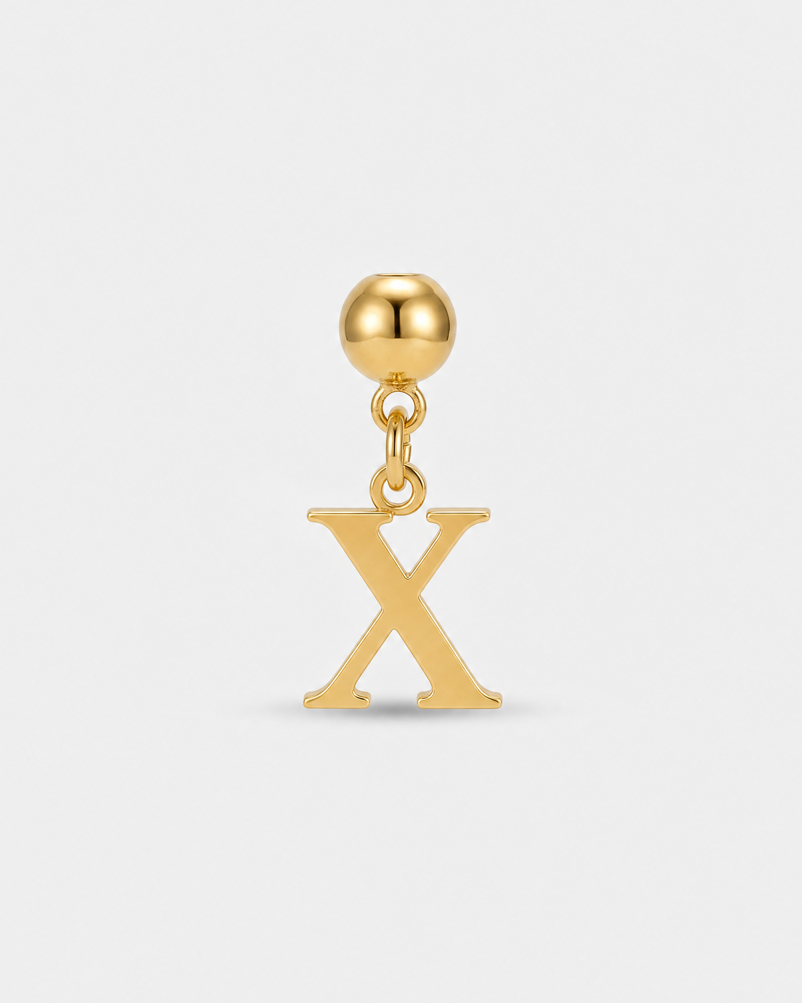 Gold initial letter X charm pendant