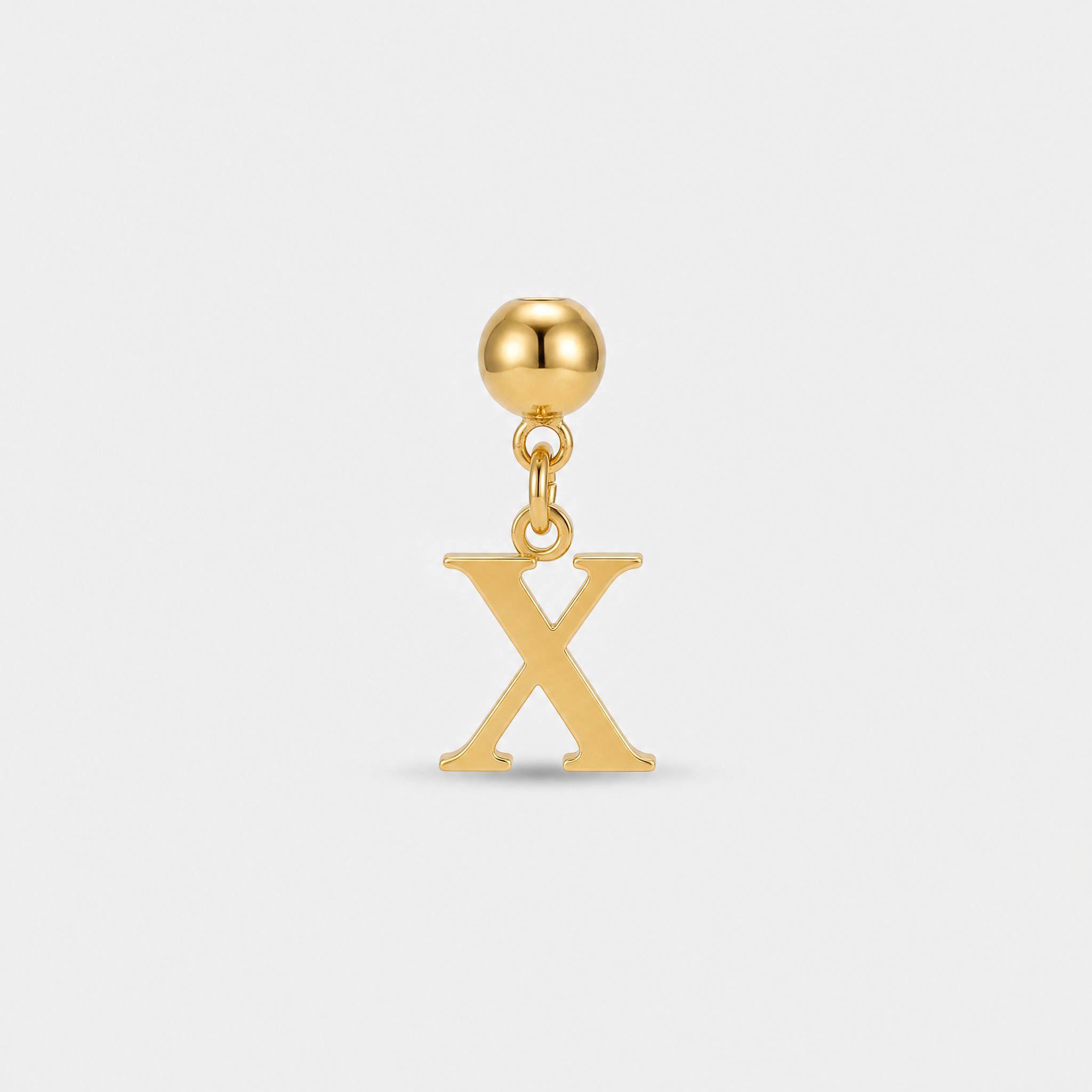 Gold initial X charm pendant