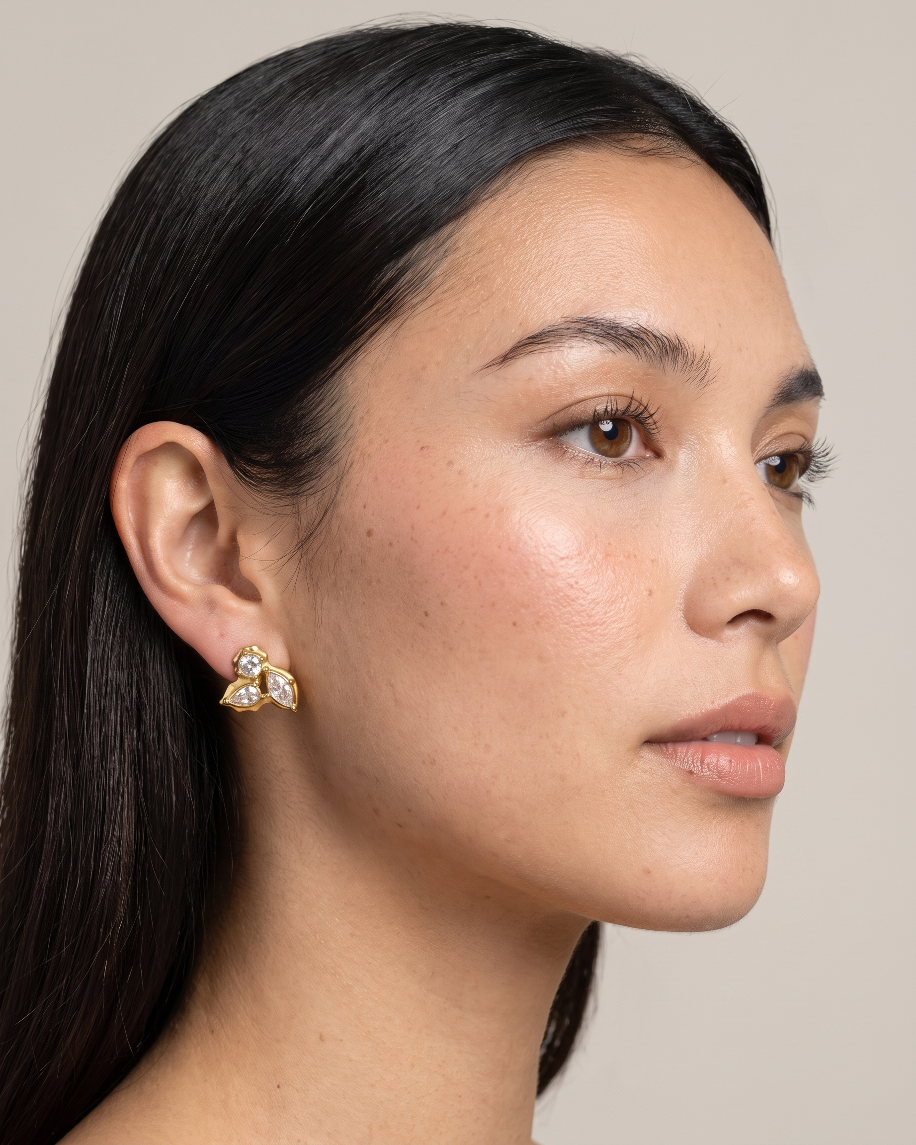 Willow earrings worn on ear