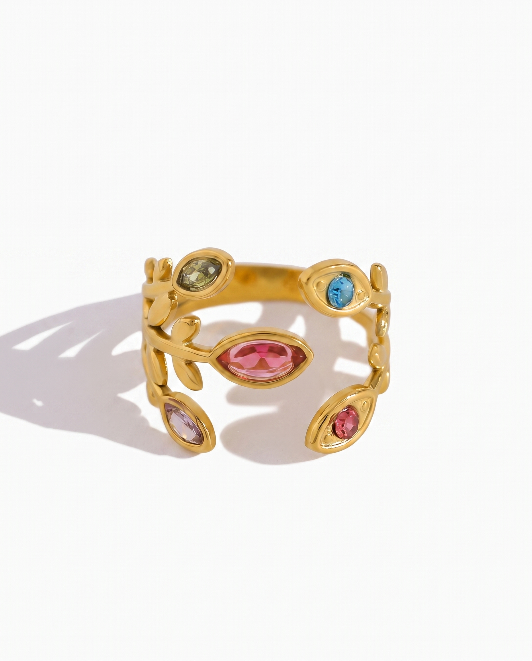 Fleur colourful crystal ring on off white background