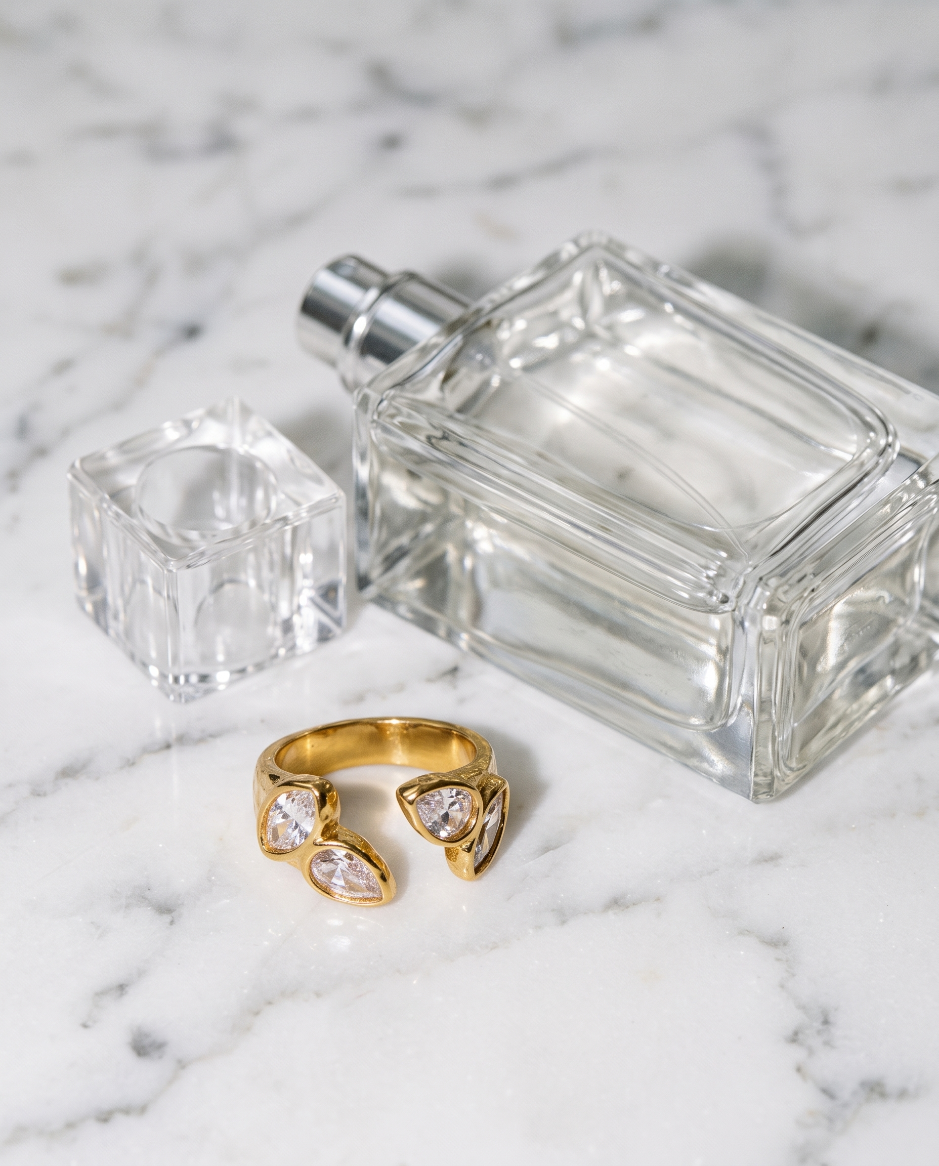 Agathe open zircon ring flatlay on marble