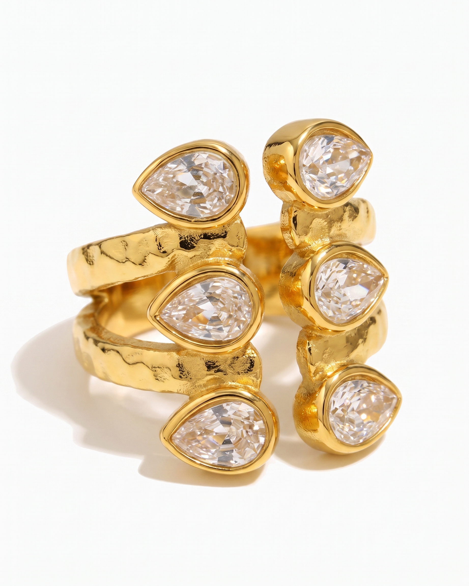 Adele double layered zircon open ring in 18k gold on off white background