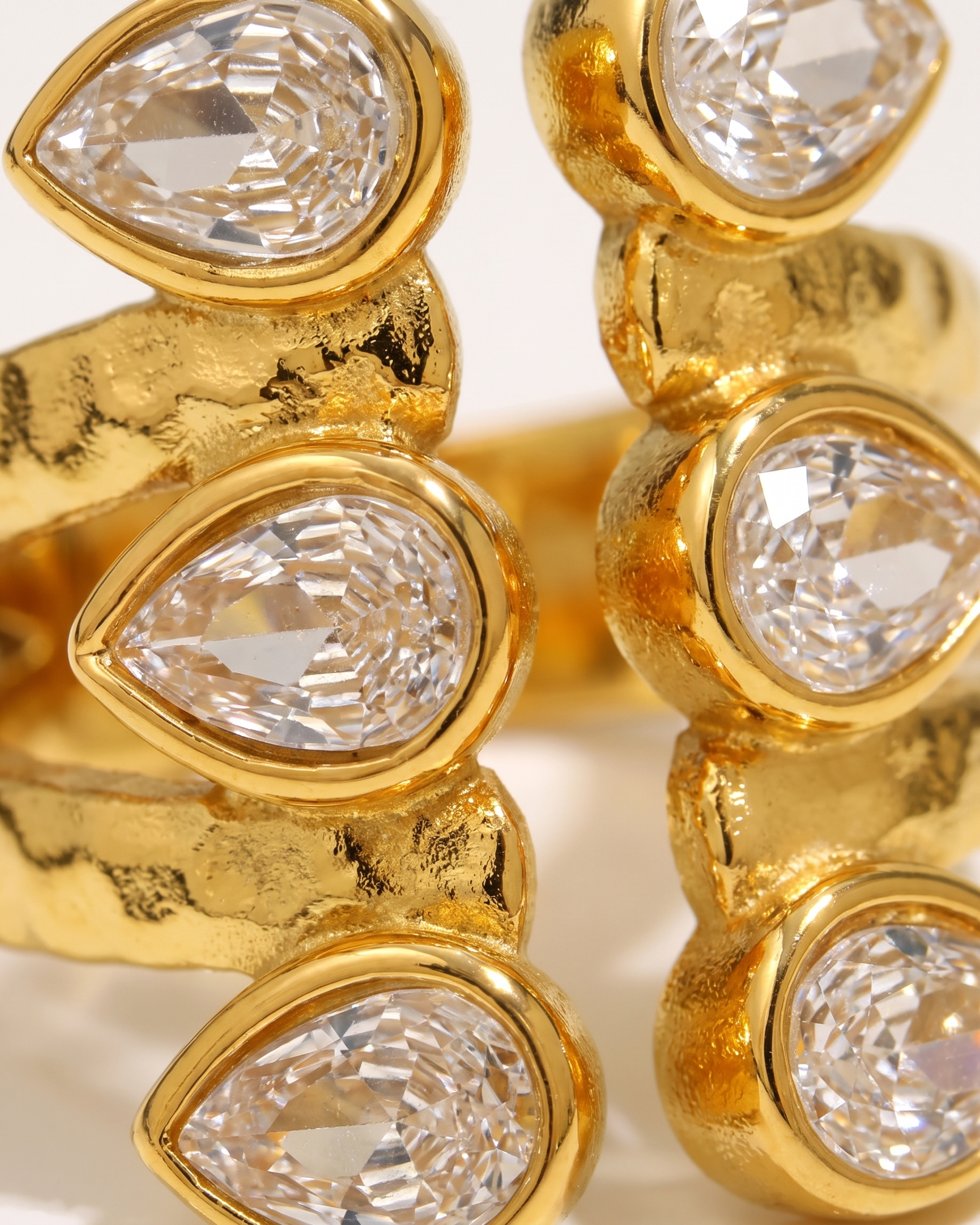 Adele zircon open ring macro detail
