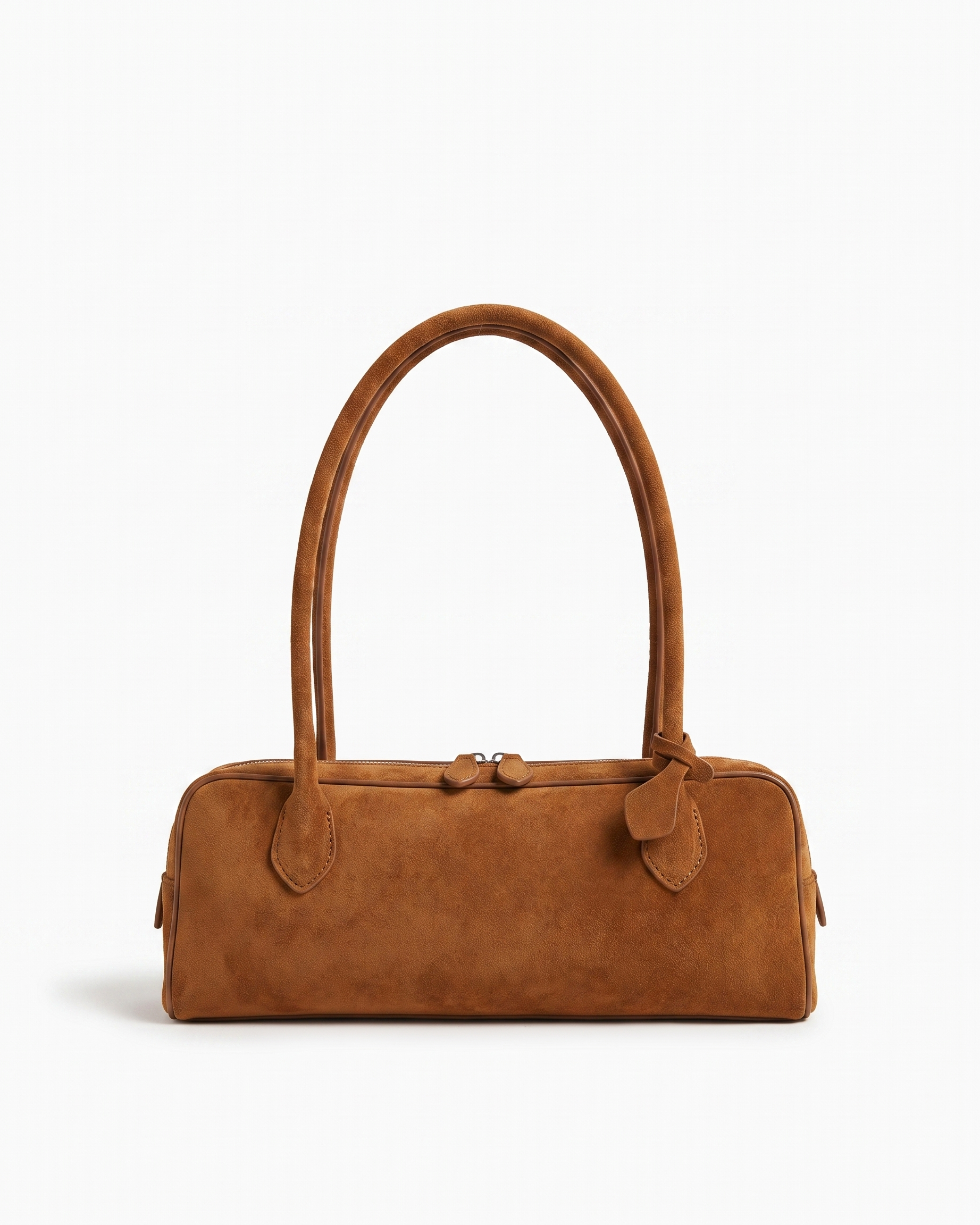 Salome suede baguette shoulder bag in cognac on off white background