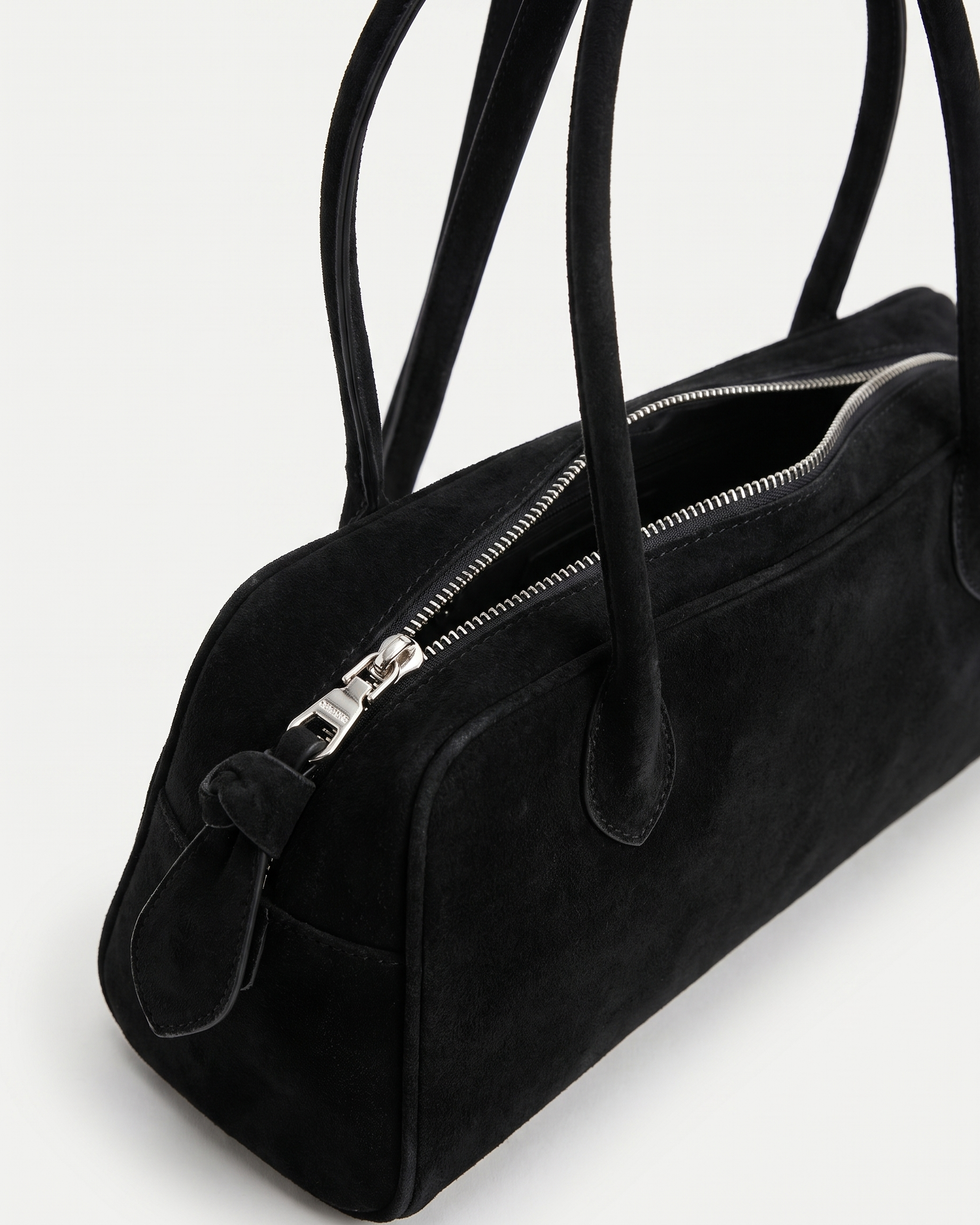 Salome black suede baguette bag zip and tab detail