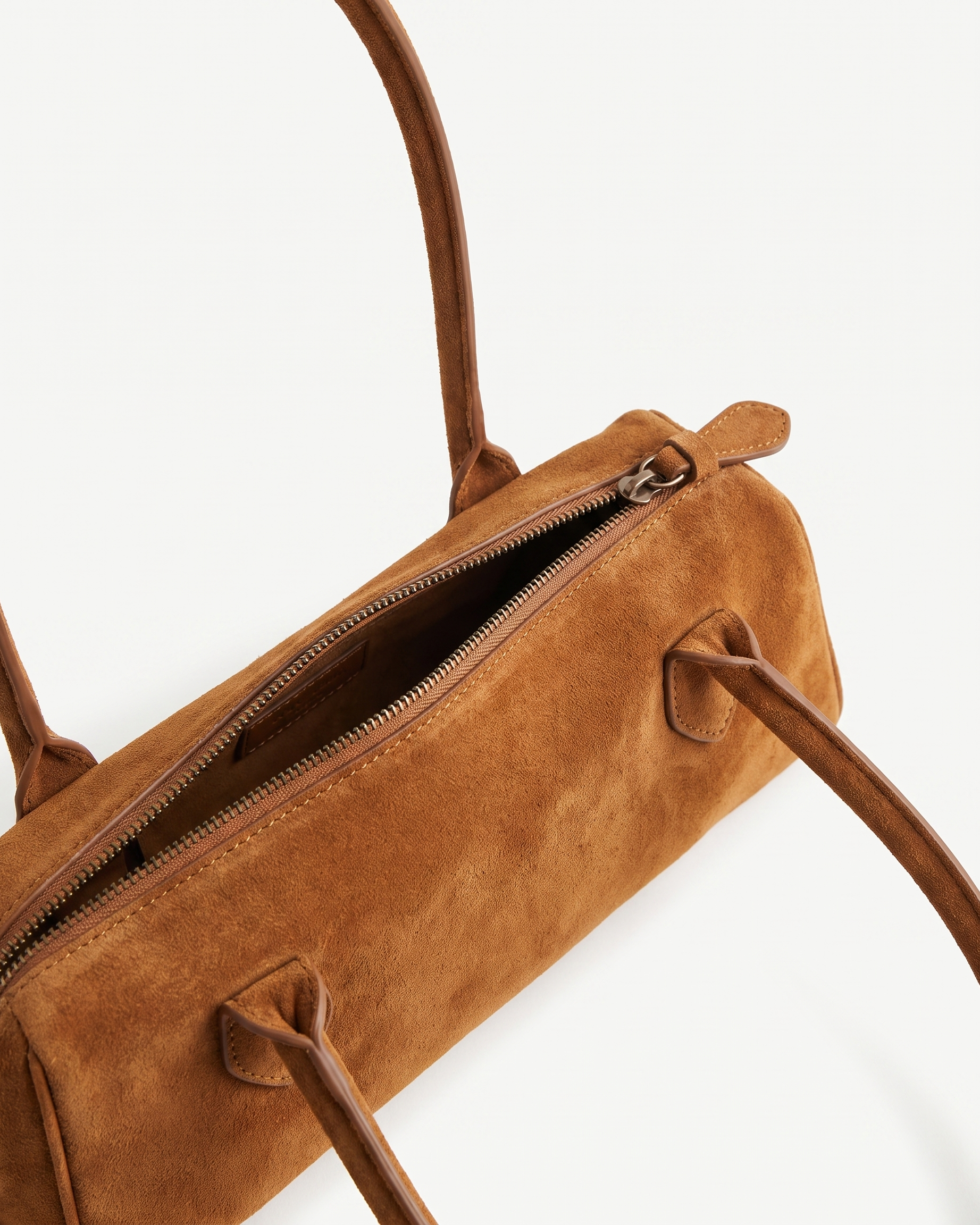 Salome cognac suede baguette bag zip and tab detail