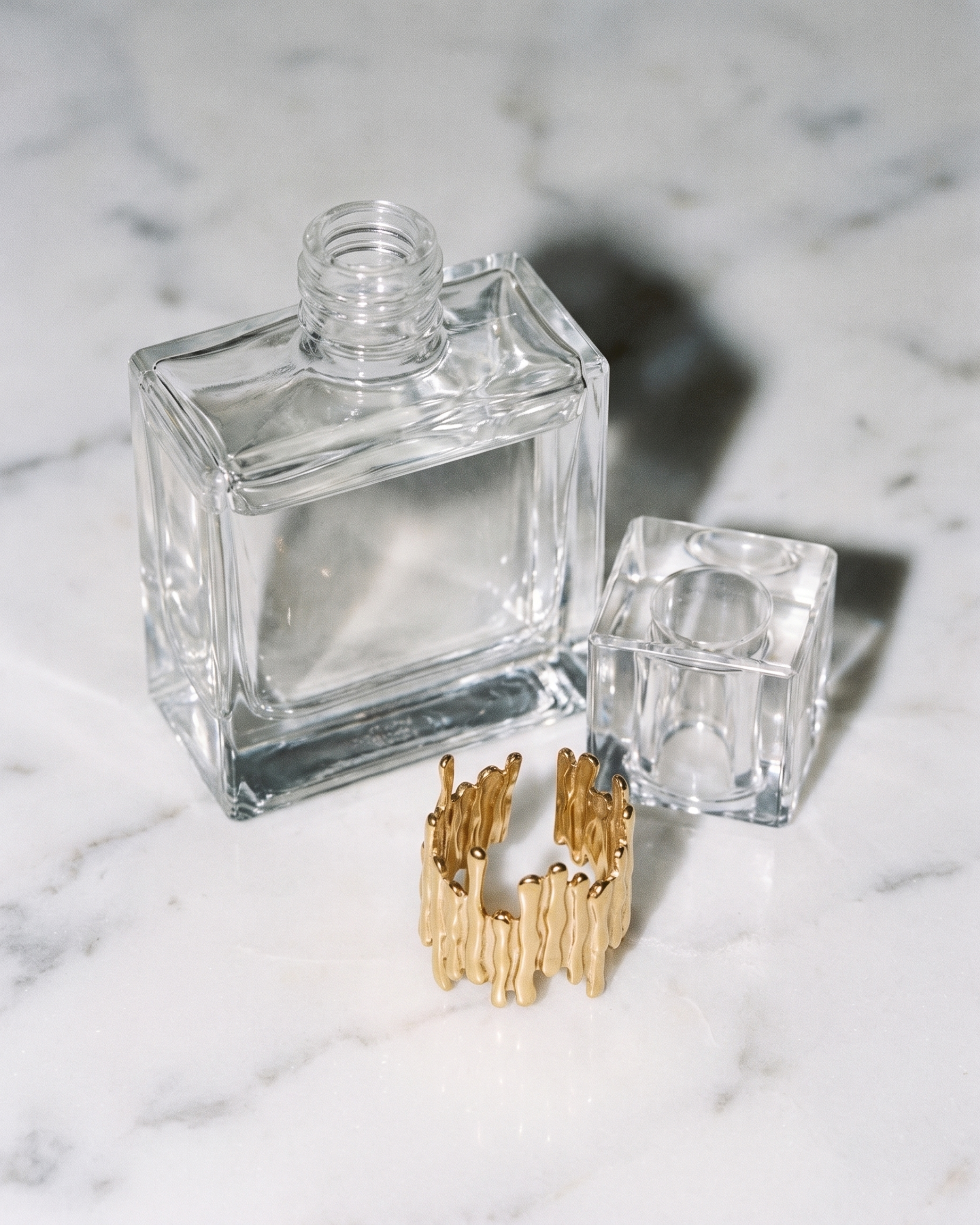 Ecorce gold bark open ring flatlay on marble