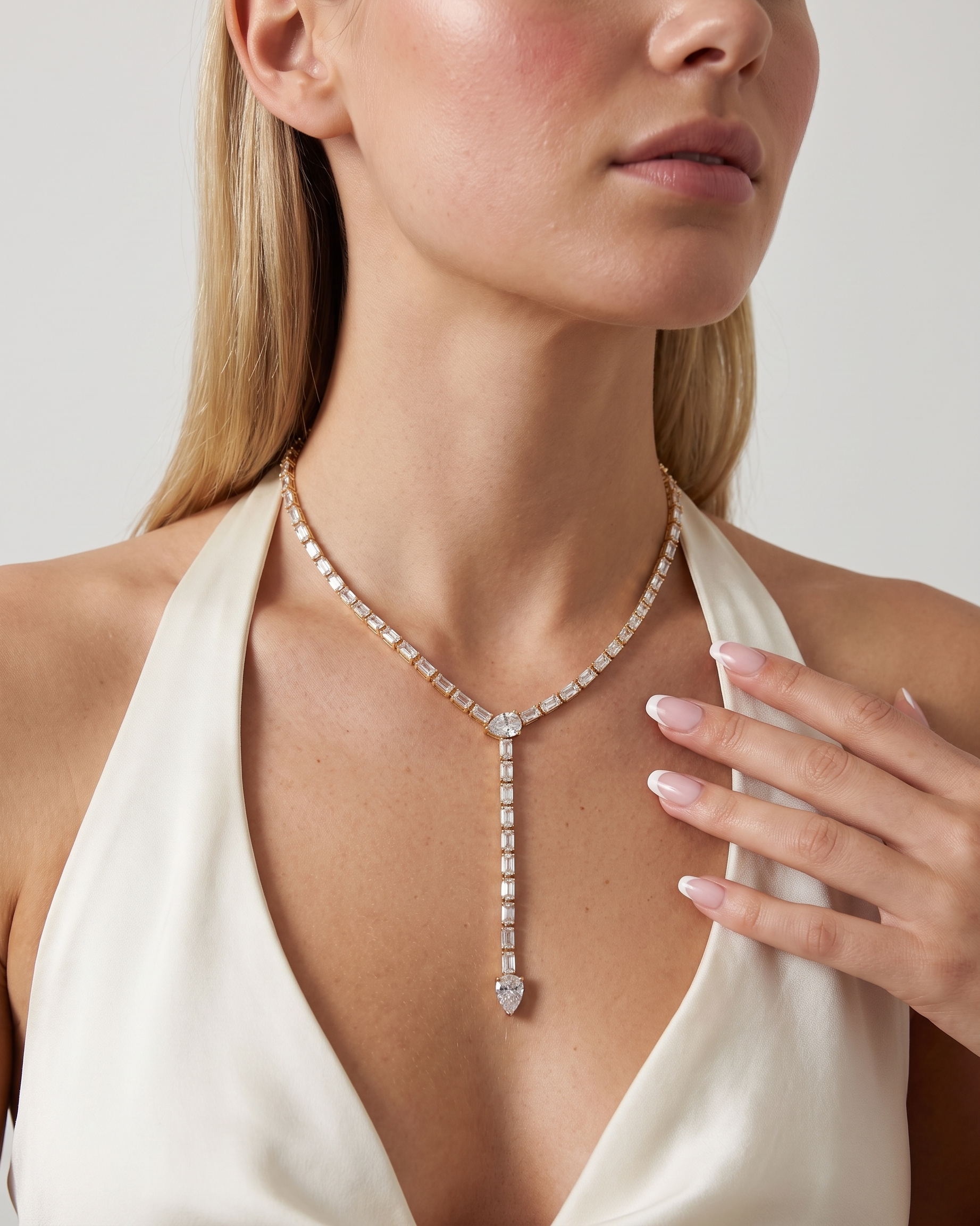Celeste lariat necklace worn on model at the collarbone