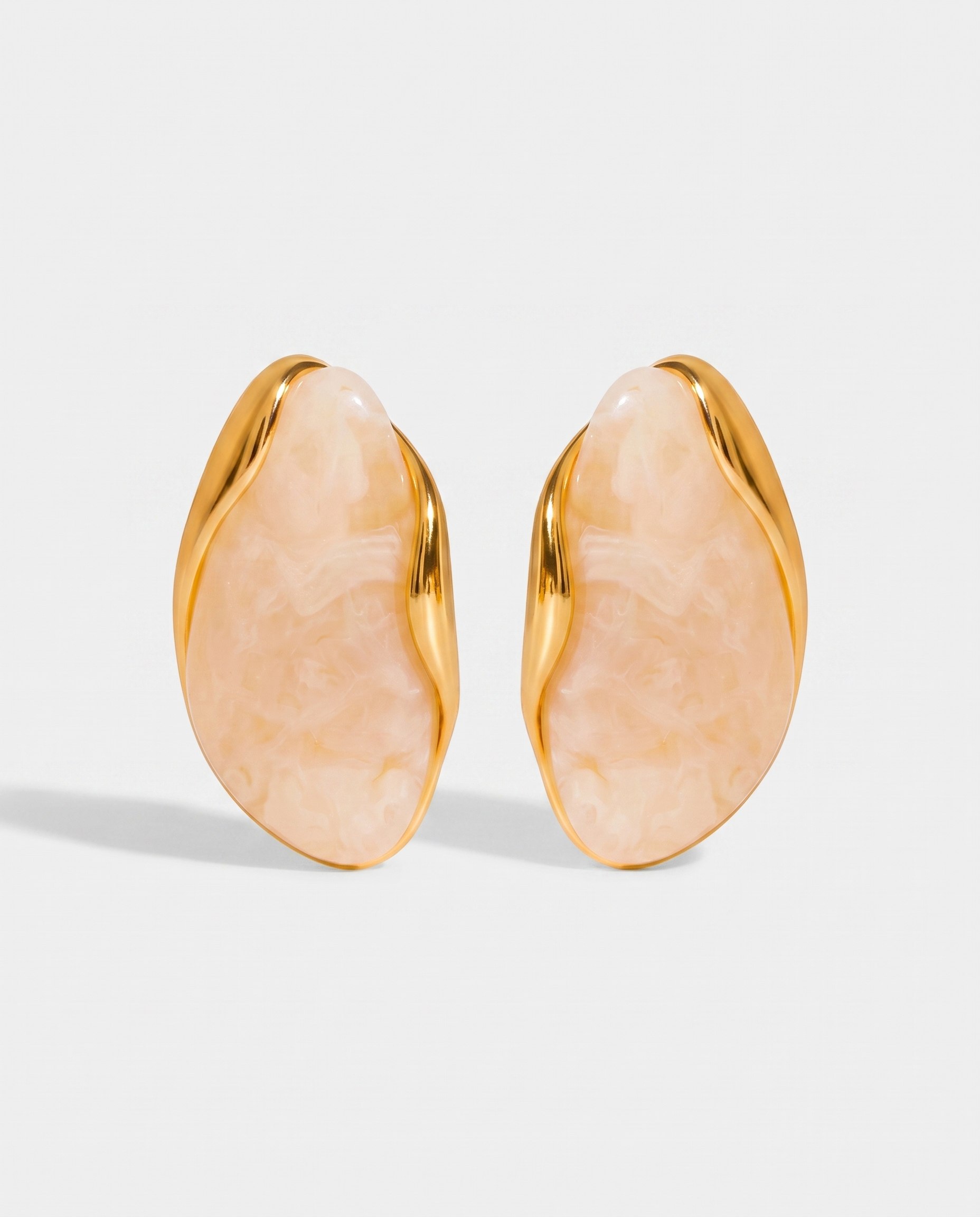Galet cream pebble studs pair on off white background