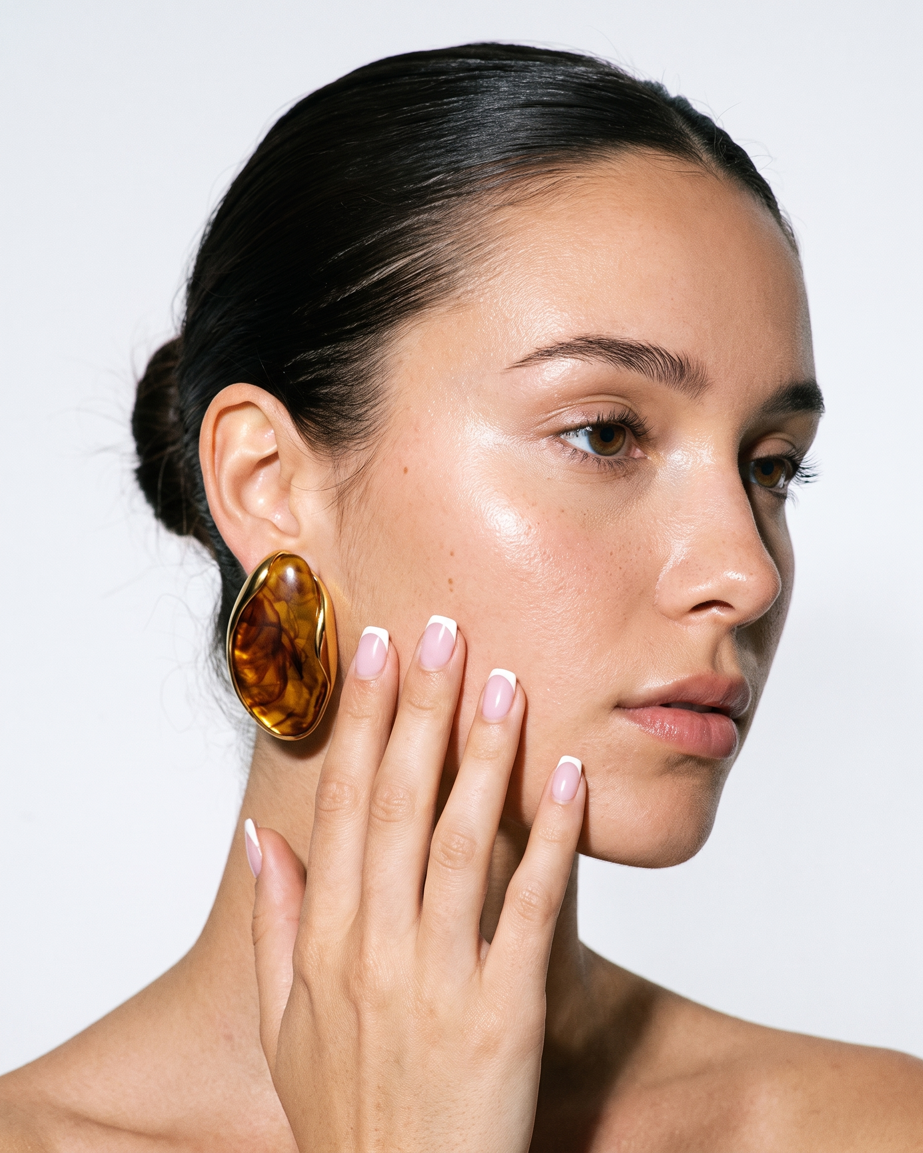 Galet amber pebble studs editorial flash