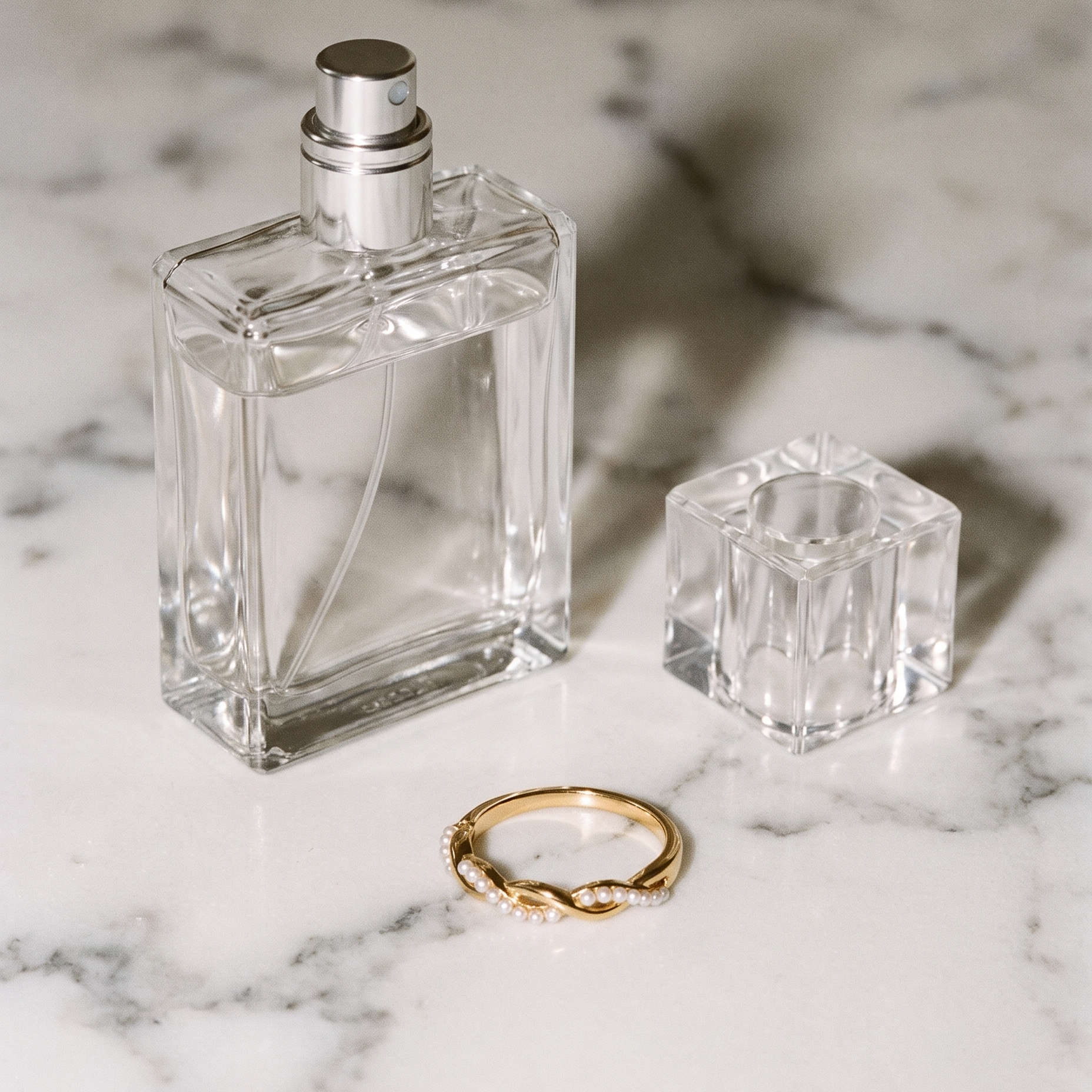 Torsade twisted pearl ring flatlay on marble