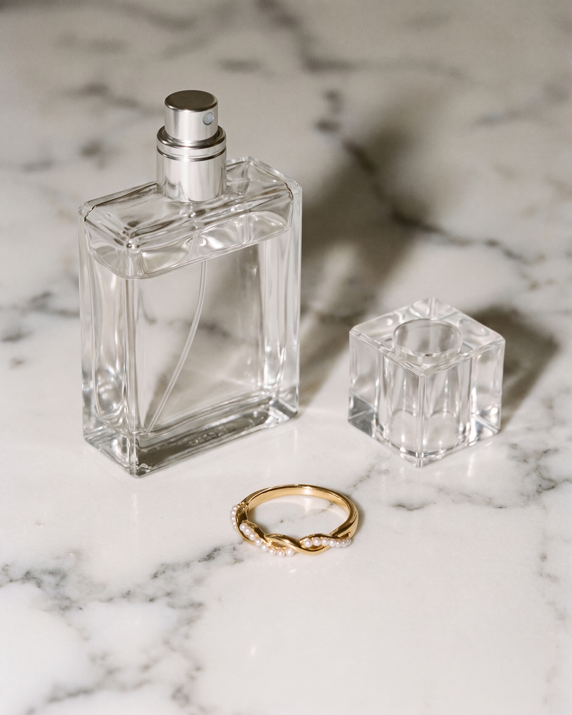 Torsade twisted pearl ring flatlay on marble