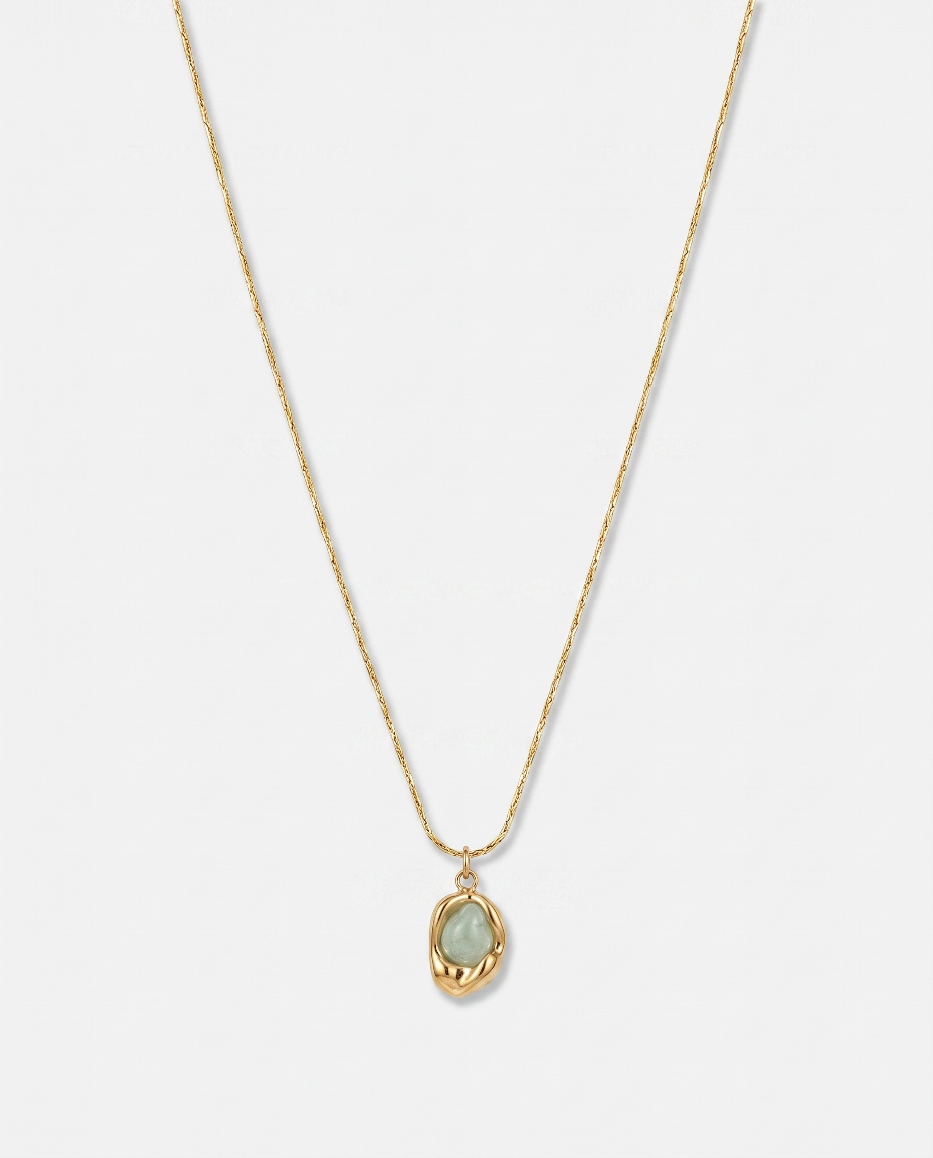 Caillou green natural stone pendant gold necklace on off white background