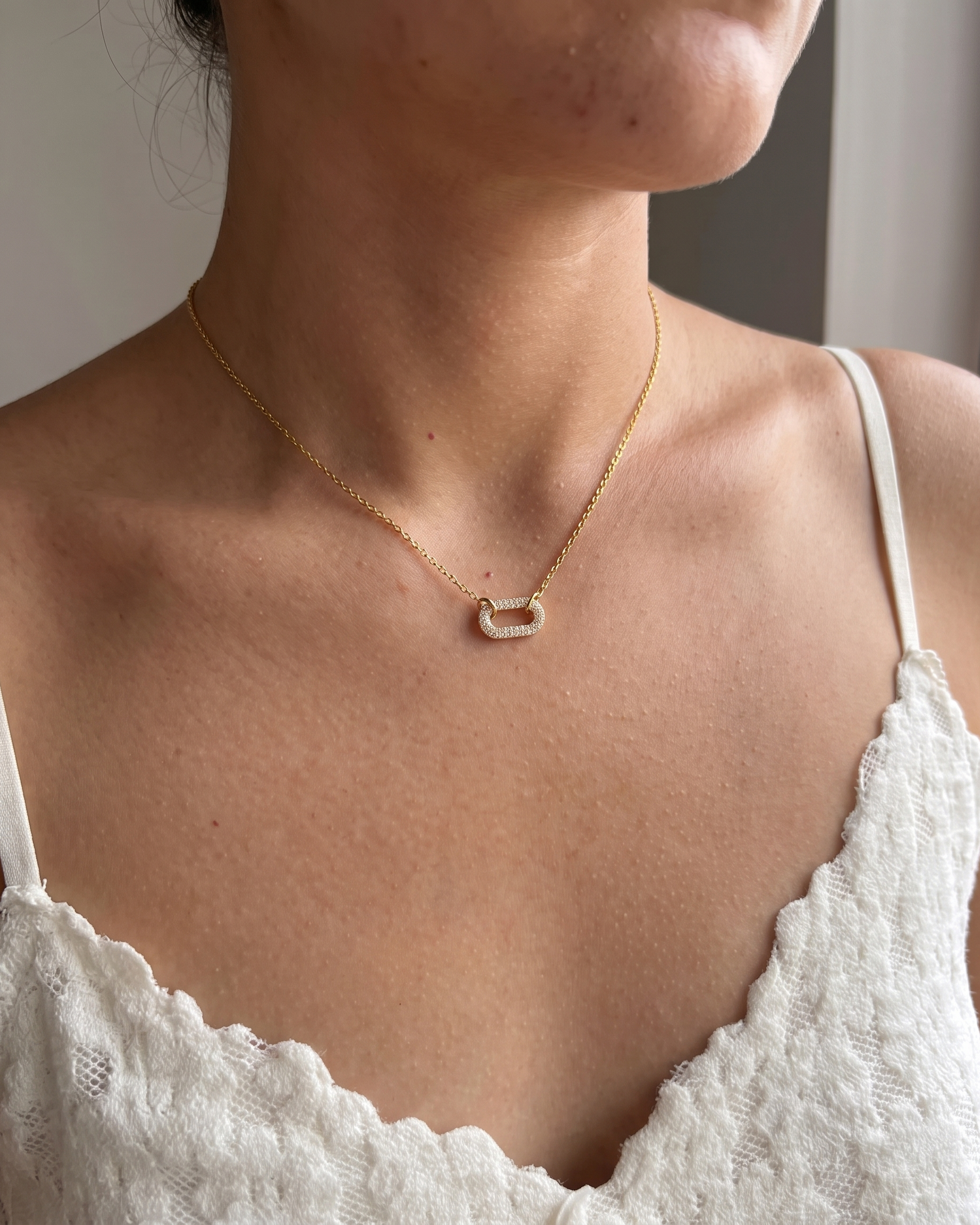 Anneau double ring zircon necklace worn on model
