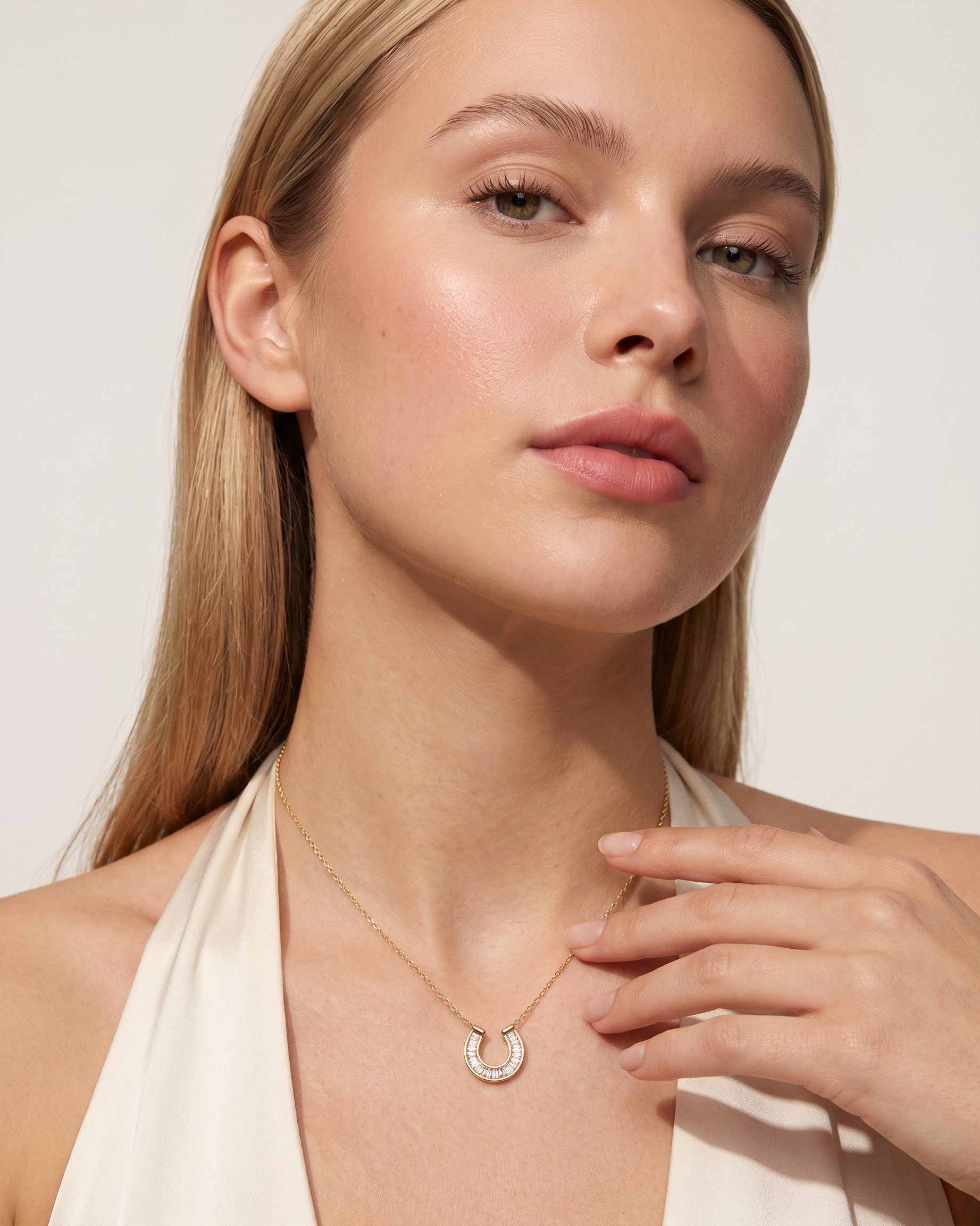 Lucky horseshoe necklace editorial studio flash