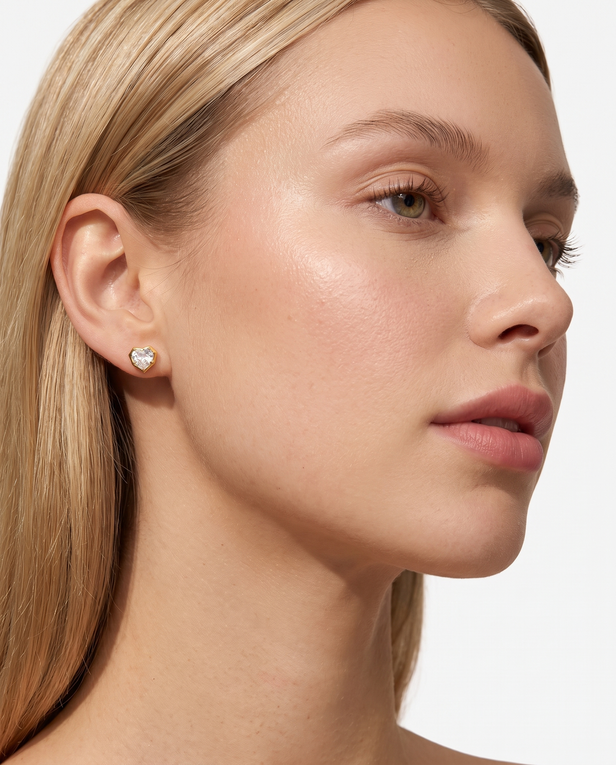 Juliette heart stud earring worn on blonde model