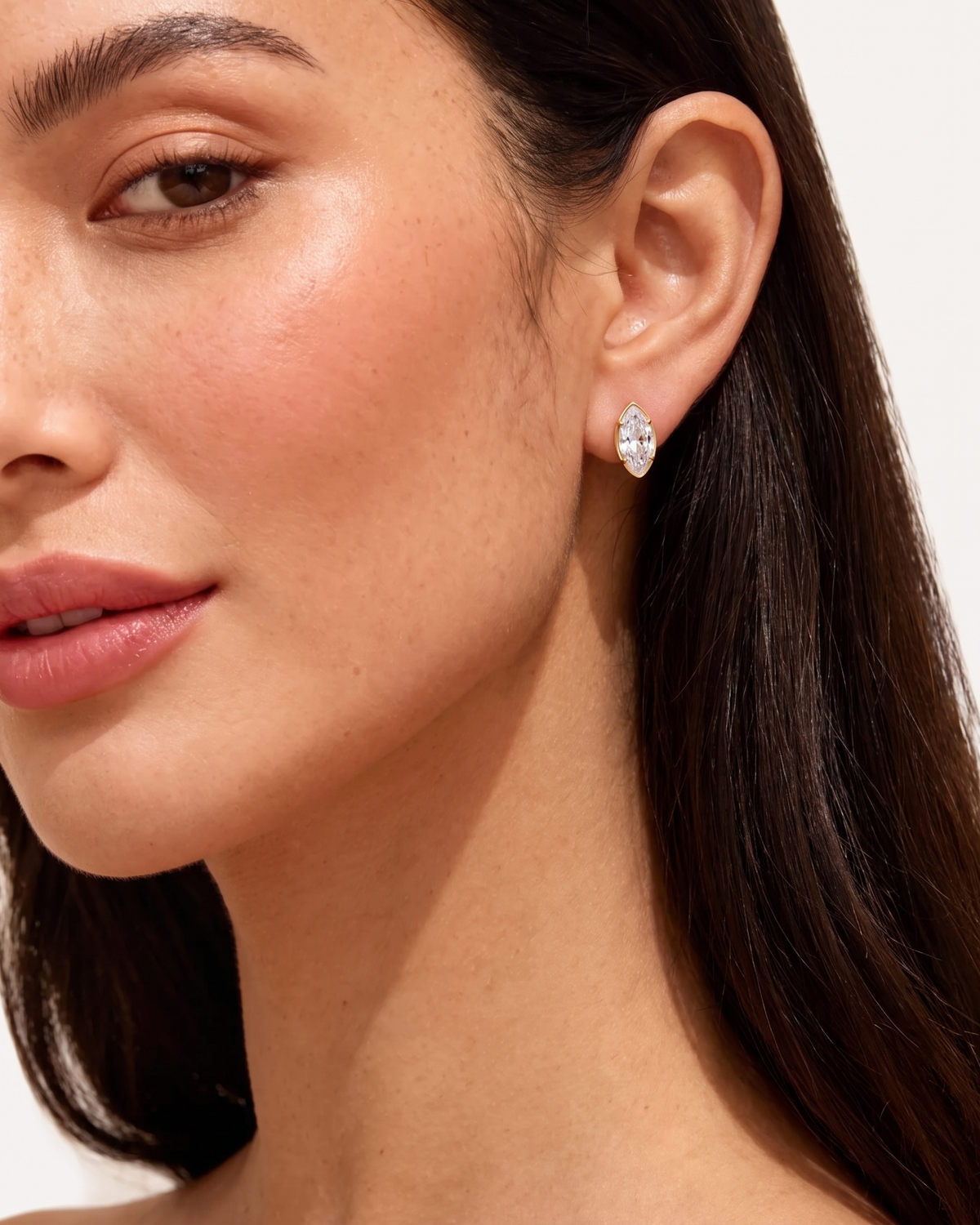 Margaux heart stud earring worn on olive skinned model