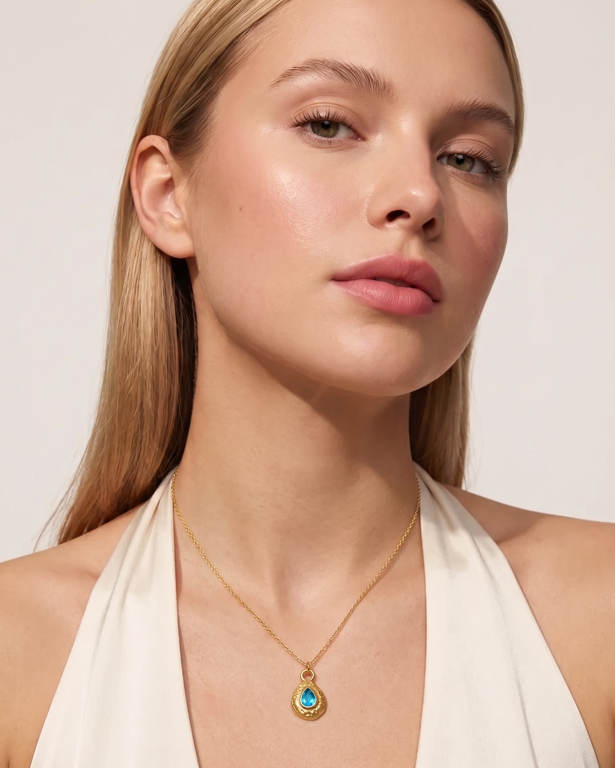 December turquoise necklace worn on model