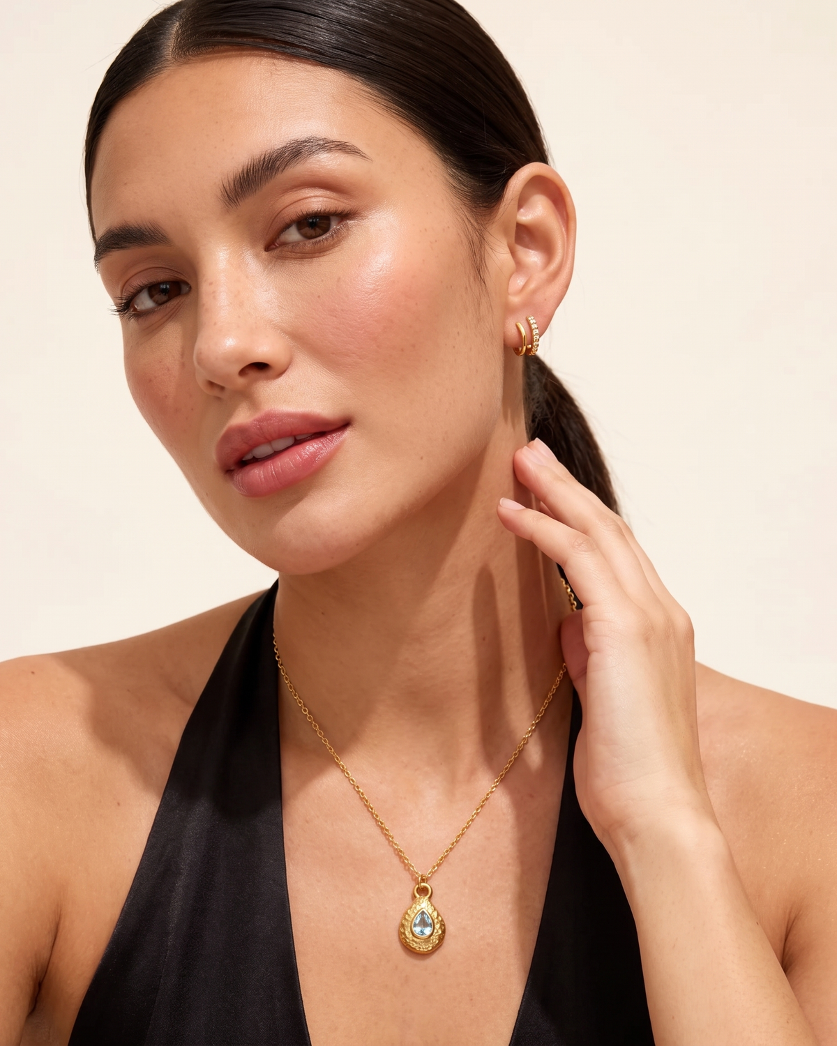 March aquamarine necklace worn on model second