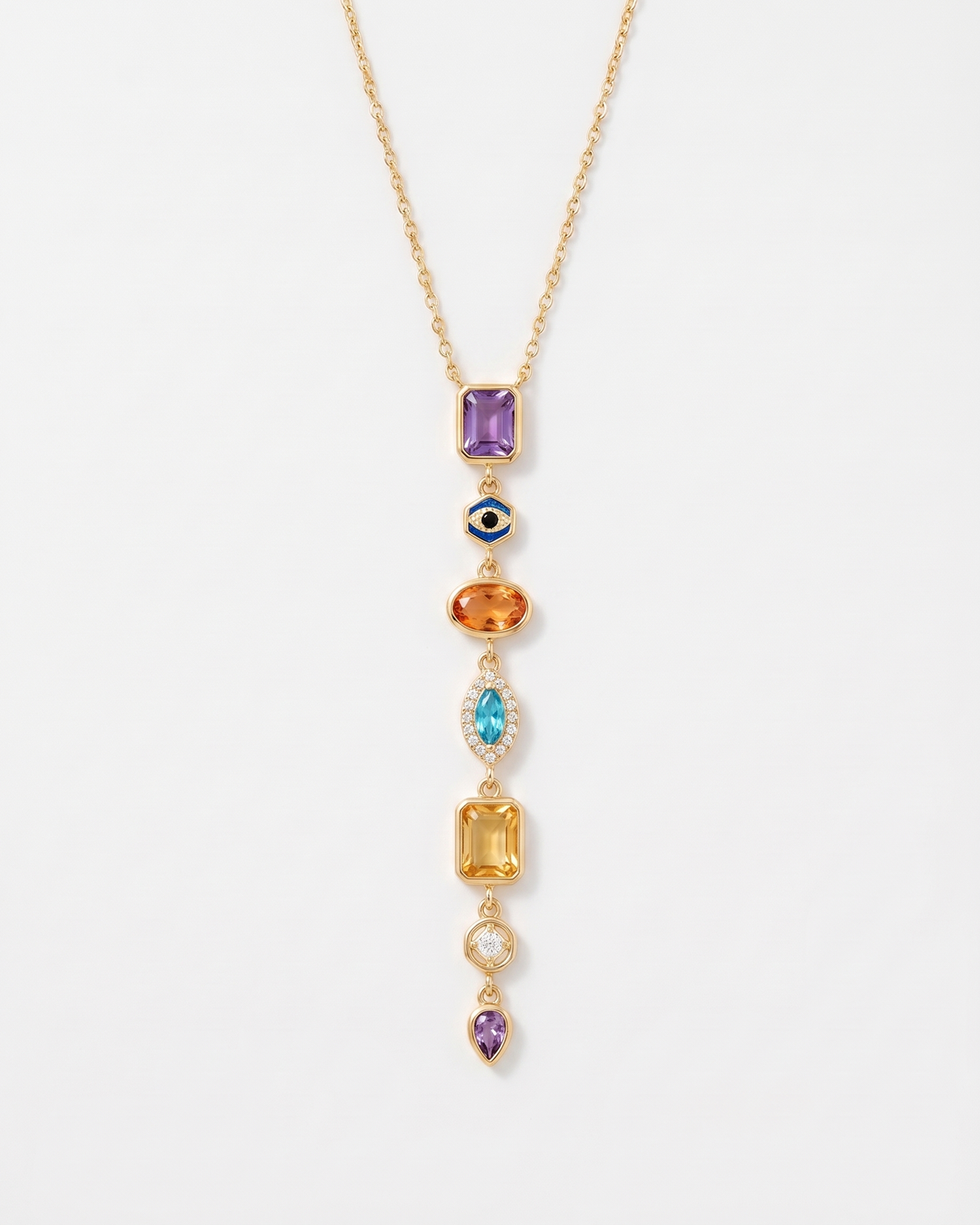 Celeste colourful gemstone drop gold necklace on soft studio background