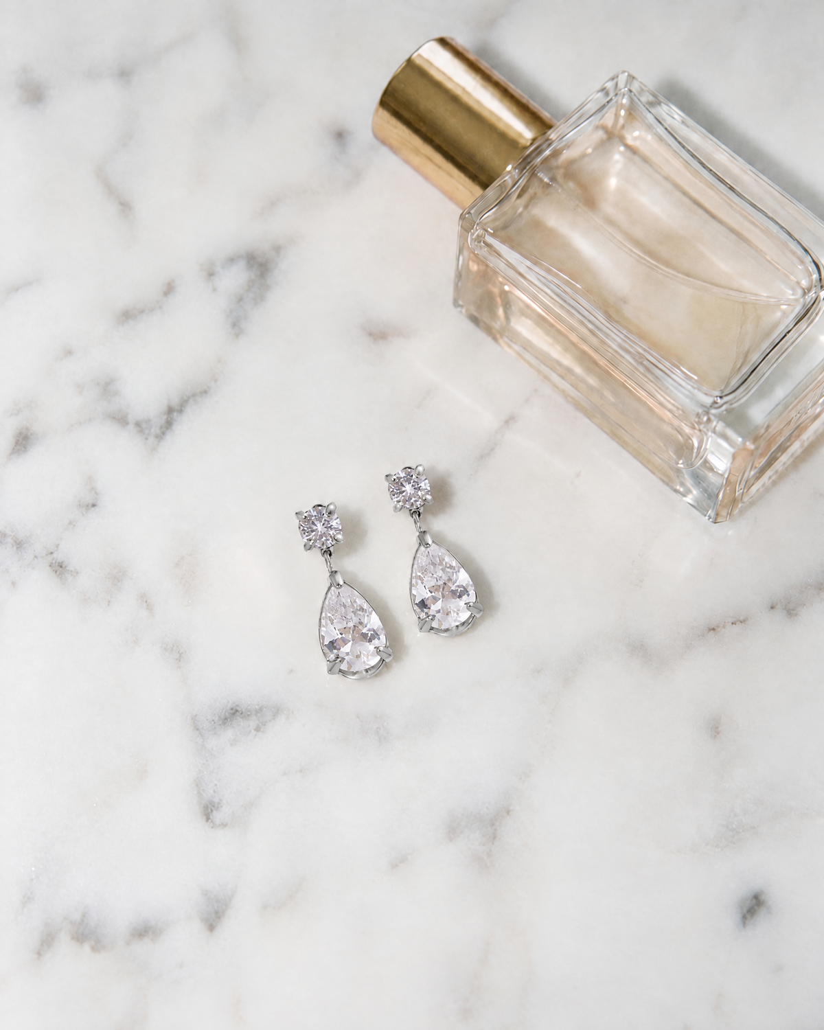Lisette Drop Earrings, silver, flatlay