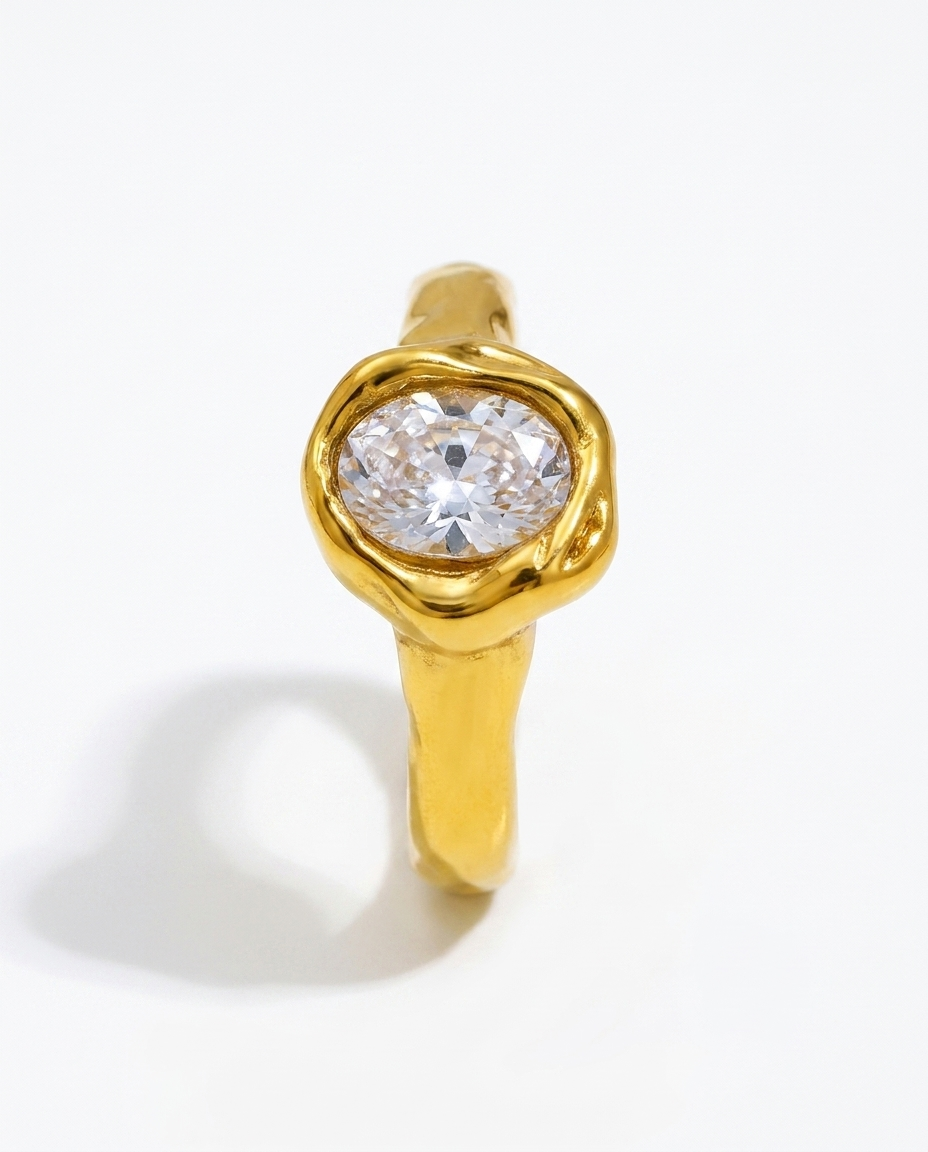 Suri Ring gold oval crystal molten bezel ring