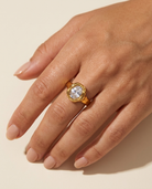 Suri Ring worn on hand gold oval crystal