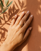 Calla Stacking Ring on hand Mediterranean lifestyle gold