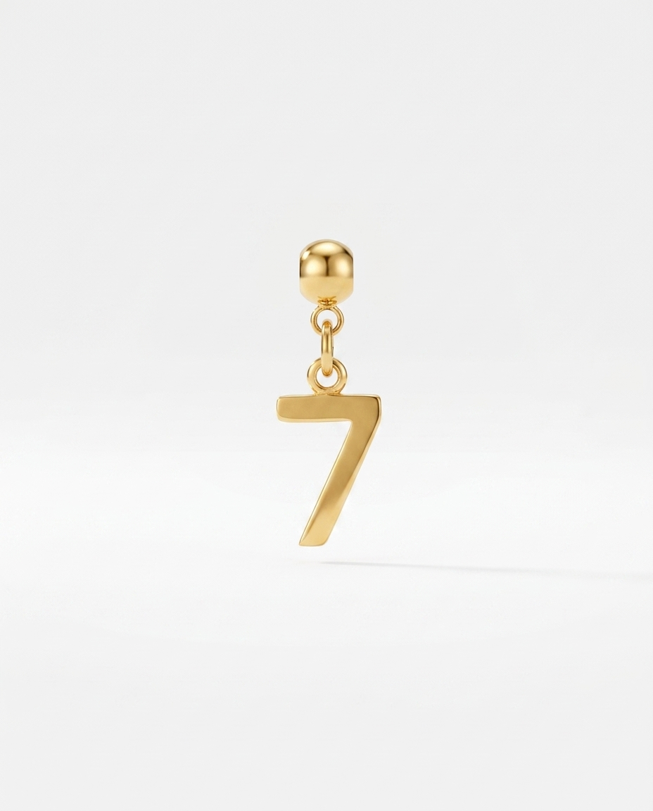 Gold number 7 charm pendant