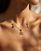 February birthstone charm necklace worn, styled